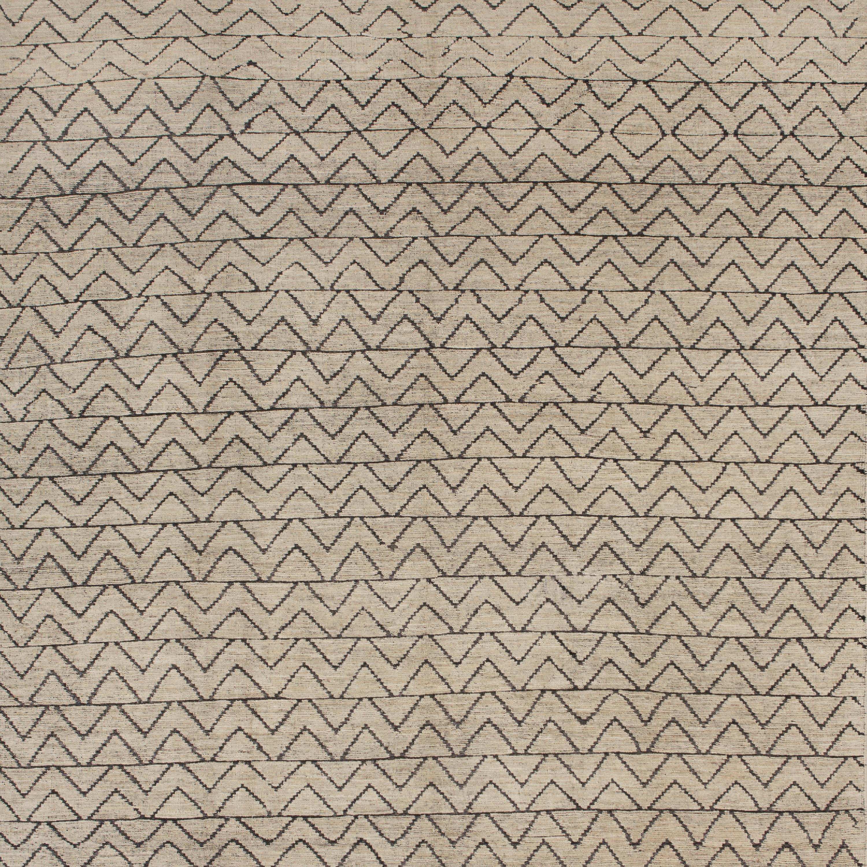 Inspired by the grounding foundations of Earth's natural colors and pure materials, this Zameen Cream and Black Geometric Wool Rug - 8'4