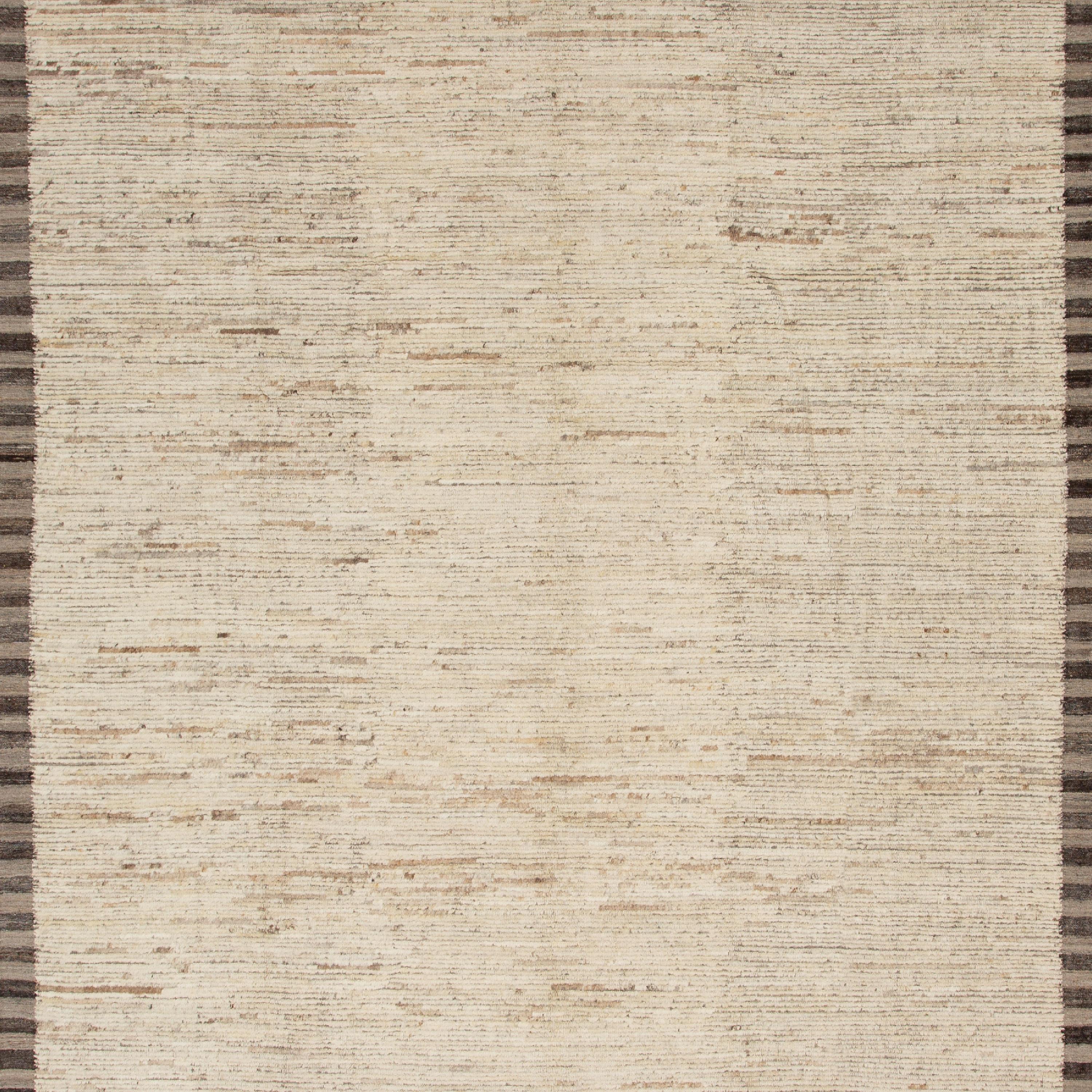 Inspired by the grounding foundations of Earth's natural colors and pure materials, this Zameen Modern Geometric Bordered Wool Rug - 9'7