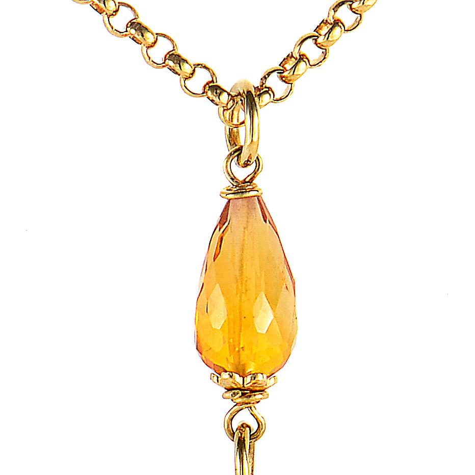 This pendant necklace from Zancan is bright and beautiful. It is made of 18K yellow gold and boasts a design that features an outstanding ~20ct of citrine.