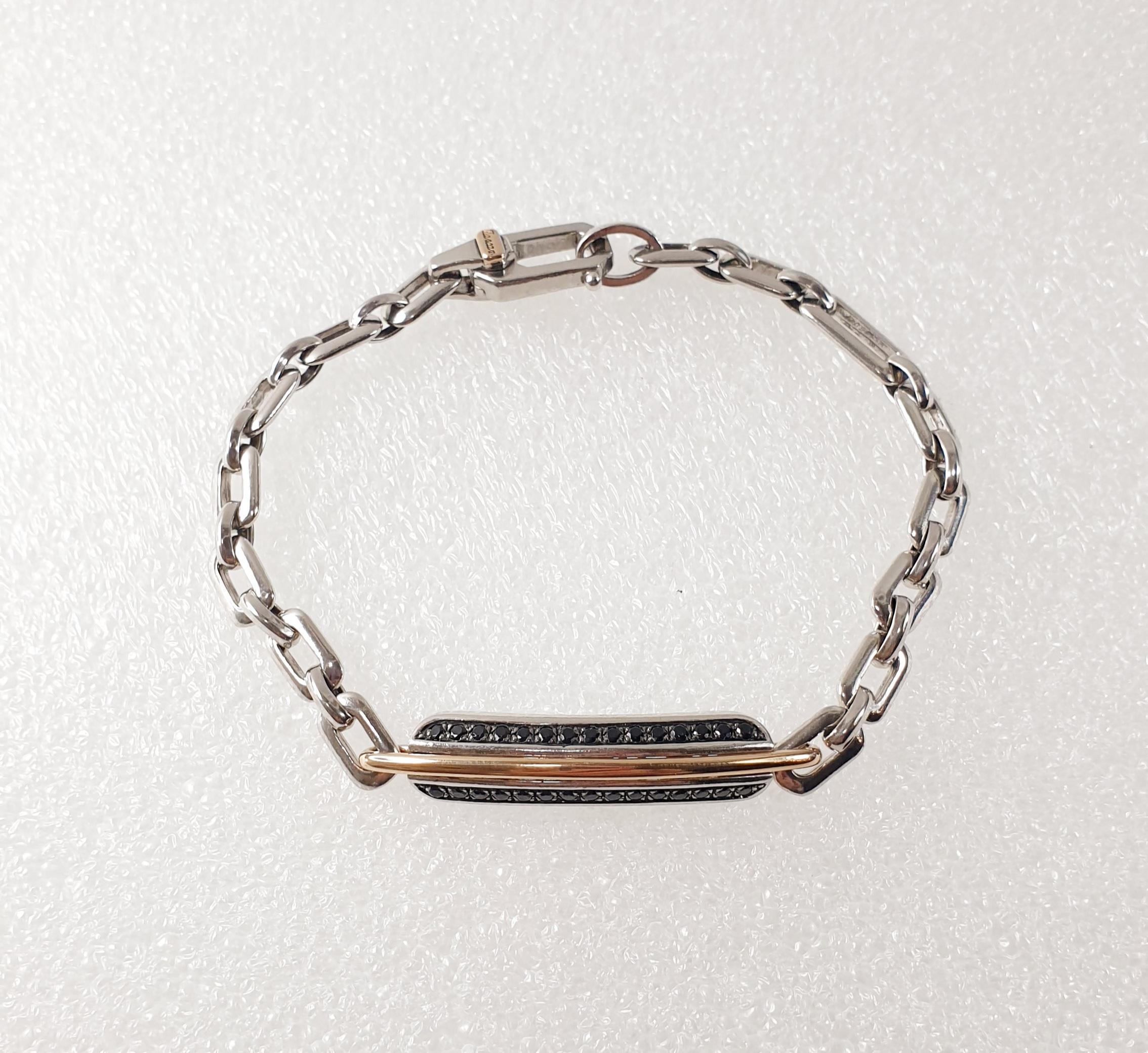 Zancan Cosmopolitanisches Armband aus Sterlingsilber, Roségold und schwarzen Spinellen
Rest des Boutique-Bestandes 

Zancan Cosmopolitan 925 Silber 8″ weiches Gliederarmband besteht aus gekreuzten geometrischen Gliedern mit polierter Oberfläche und