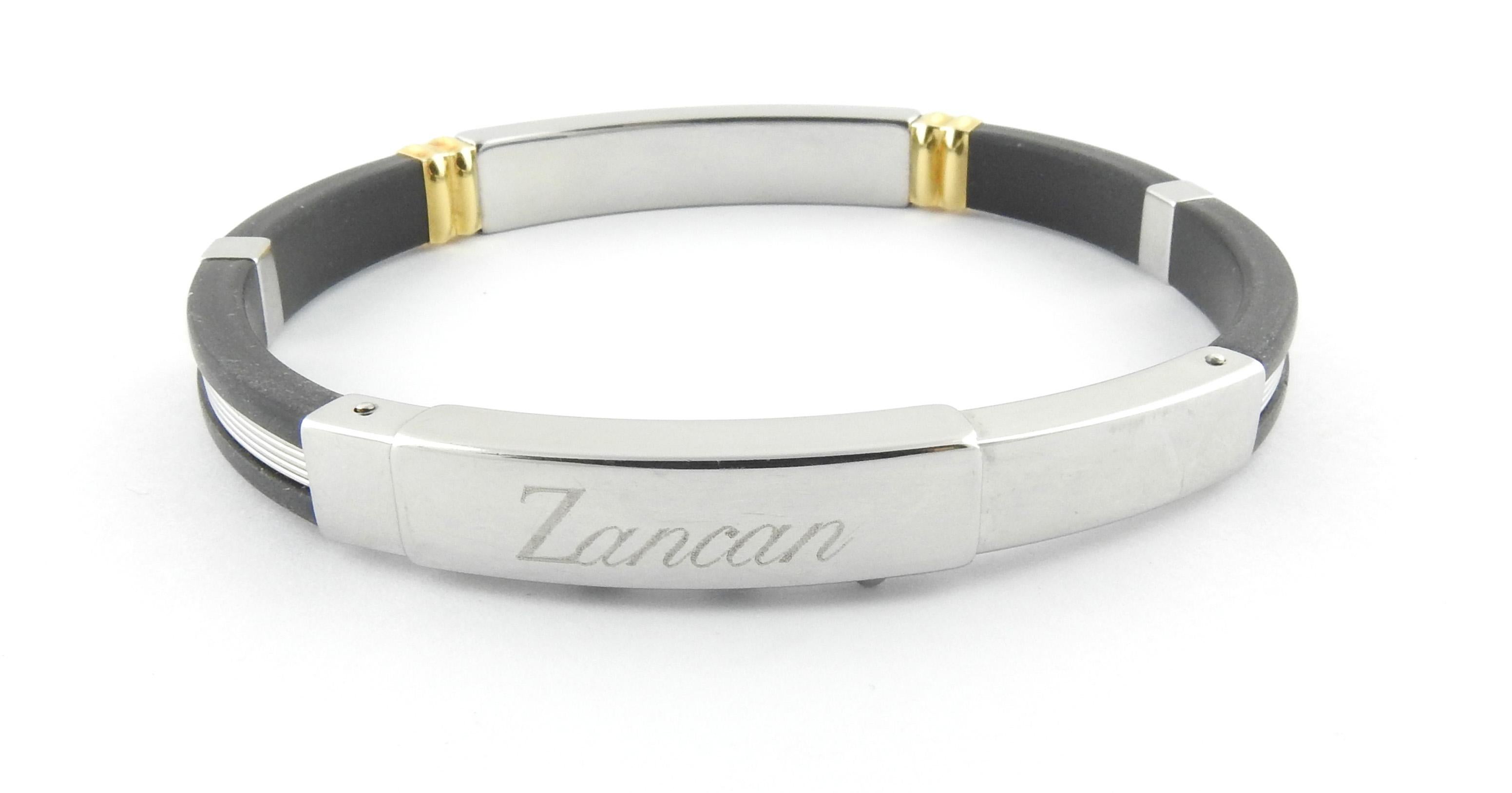 Zancan Stainless Steel 18K Yellow Gold Black Rubber Men's Bracelet

This stylish men's bracelet features a black rubber band with stainless steel stations and yellow gold accents.

The bracelet can be worn at 7.25