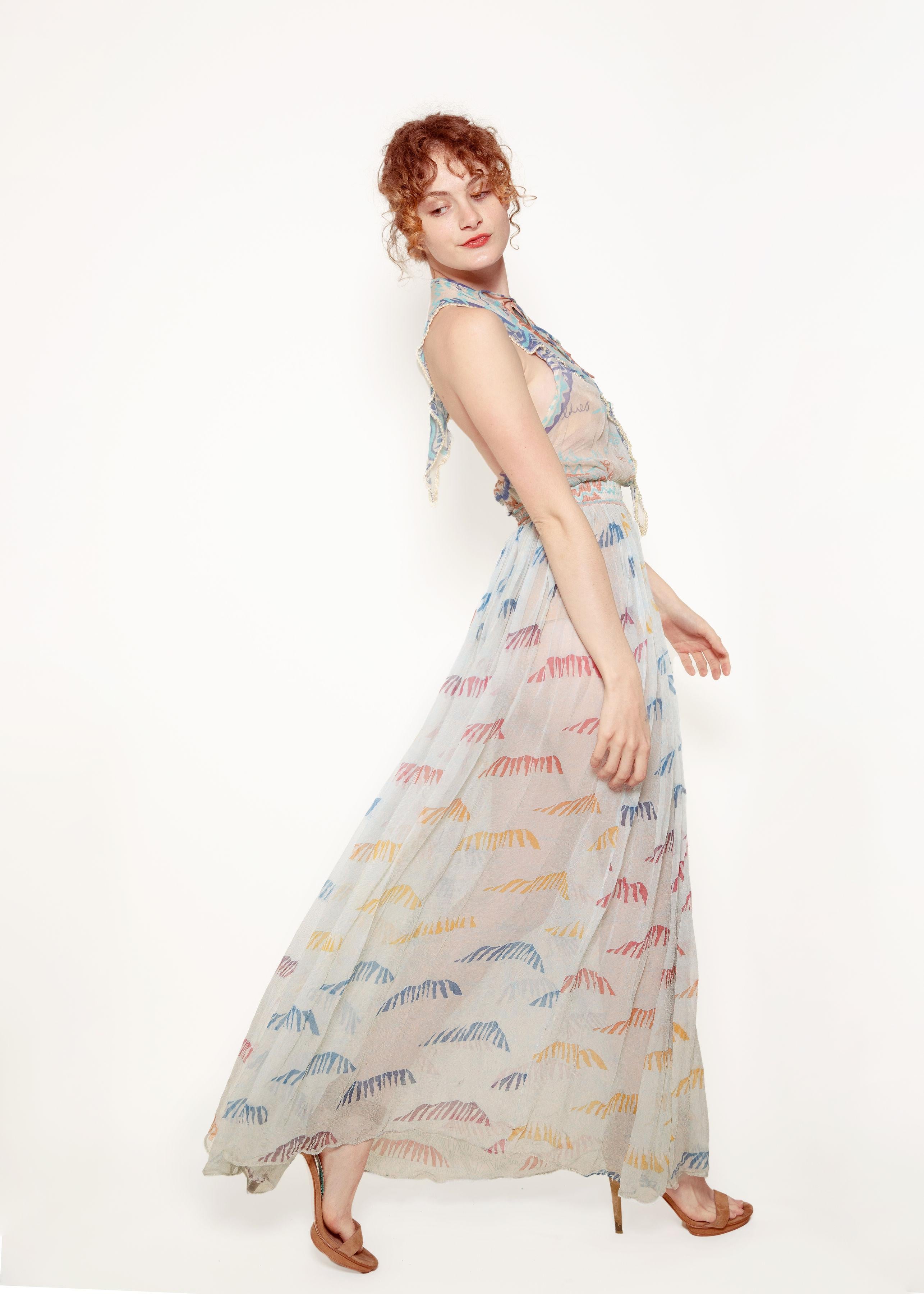 Our Zandra Rhodes 1974 dress is out of this world.  Printed With 