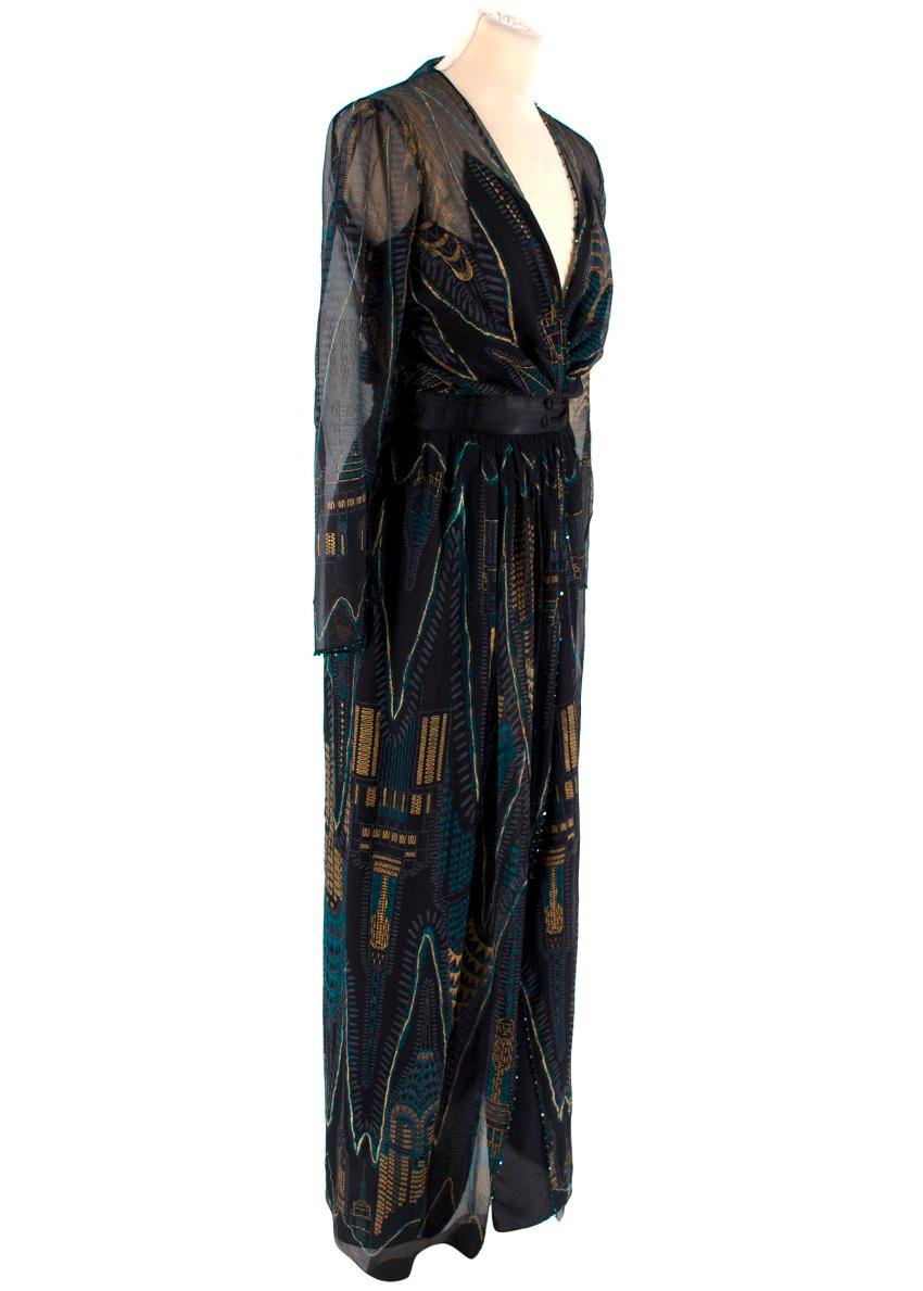 Zandra Rhodes Archive The 1985 Manhatten Dress

-Black silk wrap dress with print of Manhatten skyline
-Wrap dress with bow tie closure
-Crystal embellishment along neckline, centre and hemline
-Sheer dress with lining

Please note, these items are