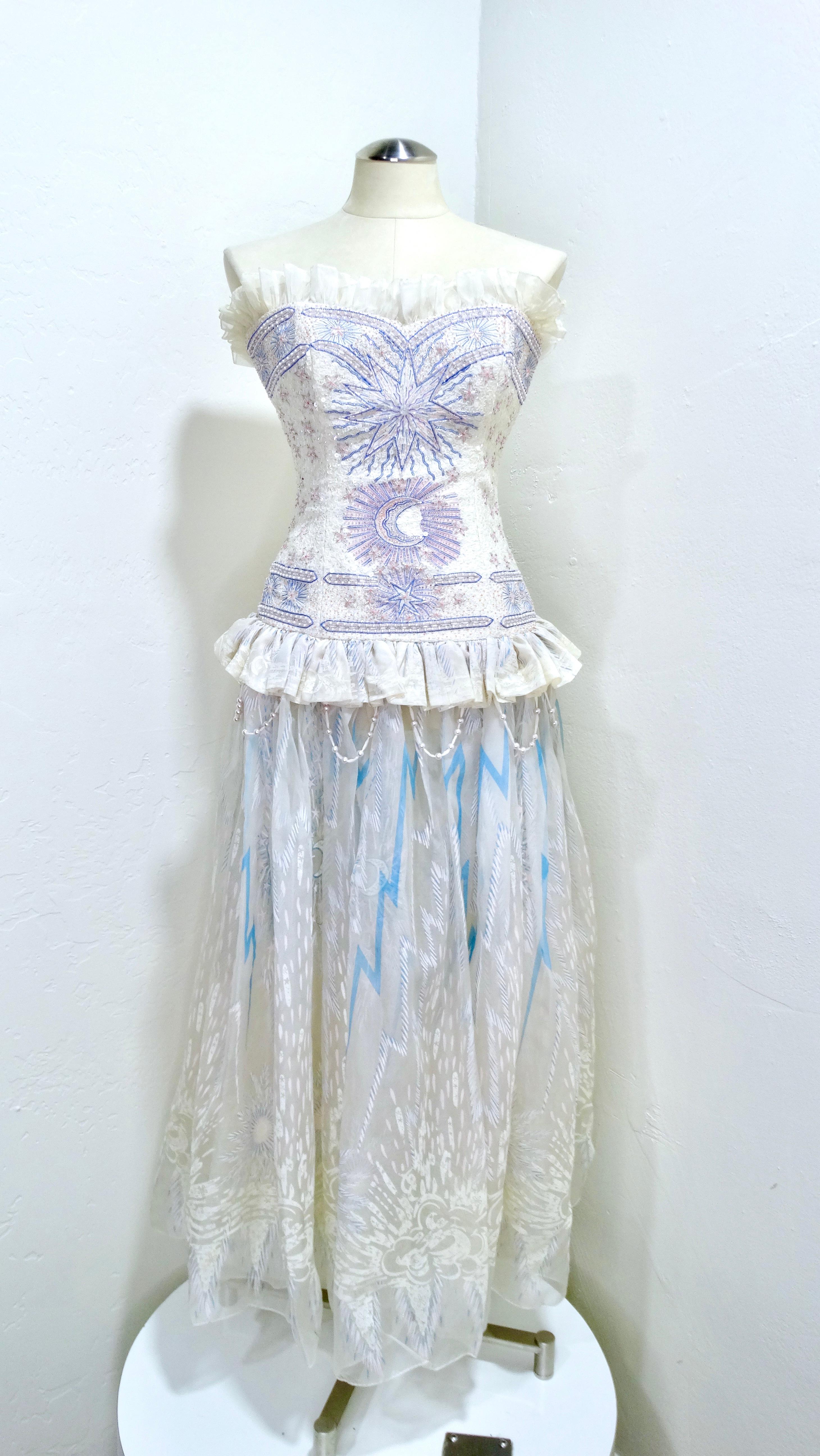 Live out all of your best princess or Zandra Rhode dreams in this custom Zandra Rhodes dress. This gown was signed by Rhodes herself in the year of 1989. Mrs. Rhodes is in the details, this exquisite piece was custom made it has intricate beading of