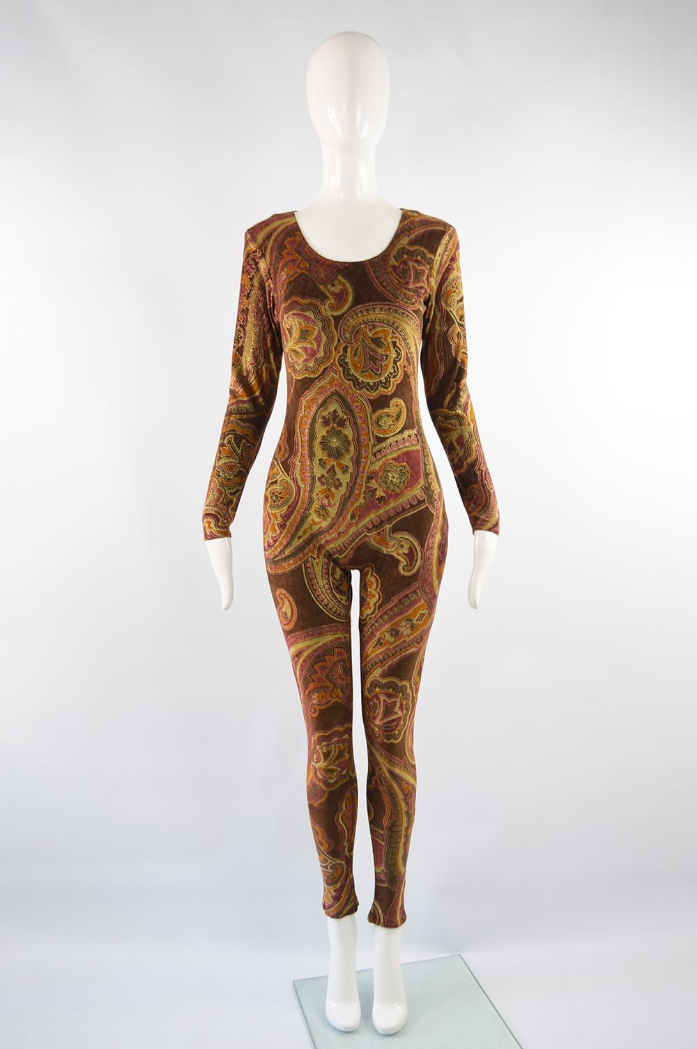 An incredible vintage Zandra Rhodes womens catsuit / jumpsuit in a brown stretch velvet / velour fabric with a gold, pink and green paisley pattern throughout. It makes the most stunning statement at a party or evening event!

Size: Not indicated;