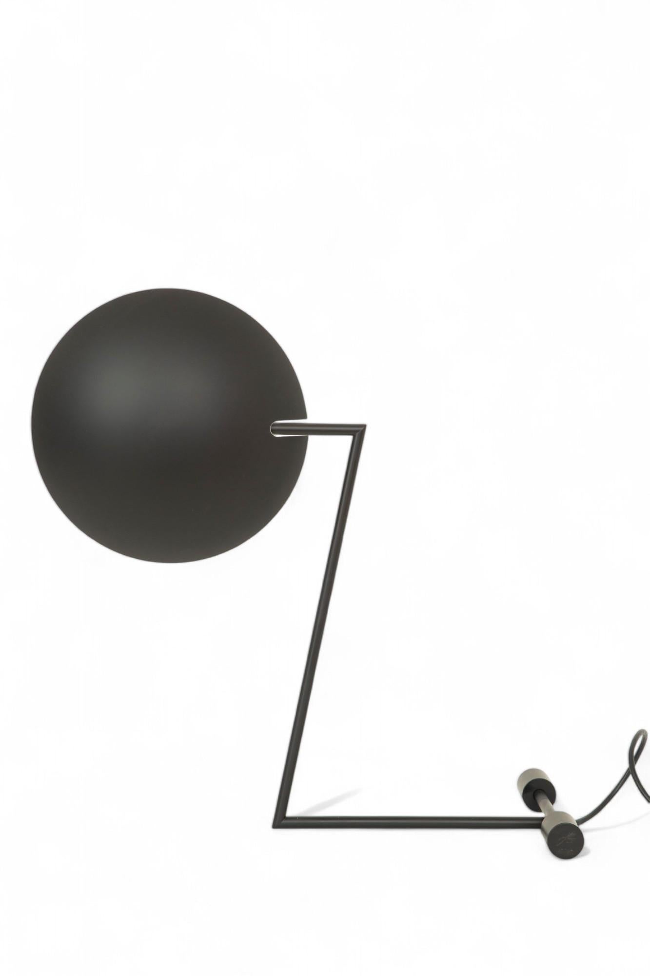 Zandt table lamp N*1 by Kevin Gray, in stock
Kevin Gray an American in Paris, designed the iconic Zandt lamps in the early 80s. The table lamp N*21 was launched in 1982. One the lamp's special features is its metal shade that rotates 360 on its