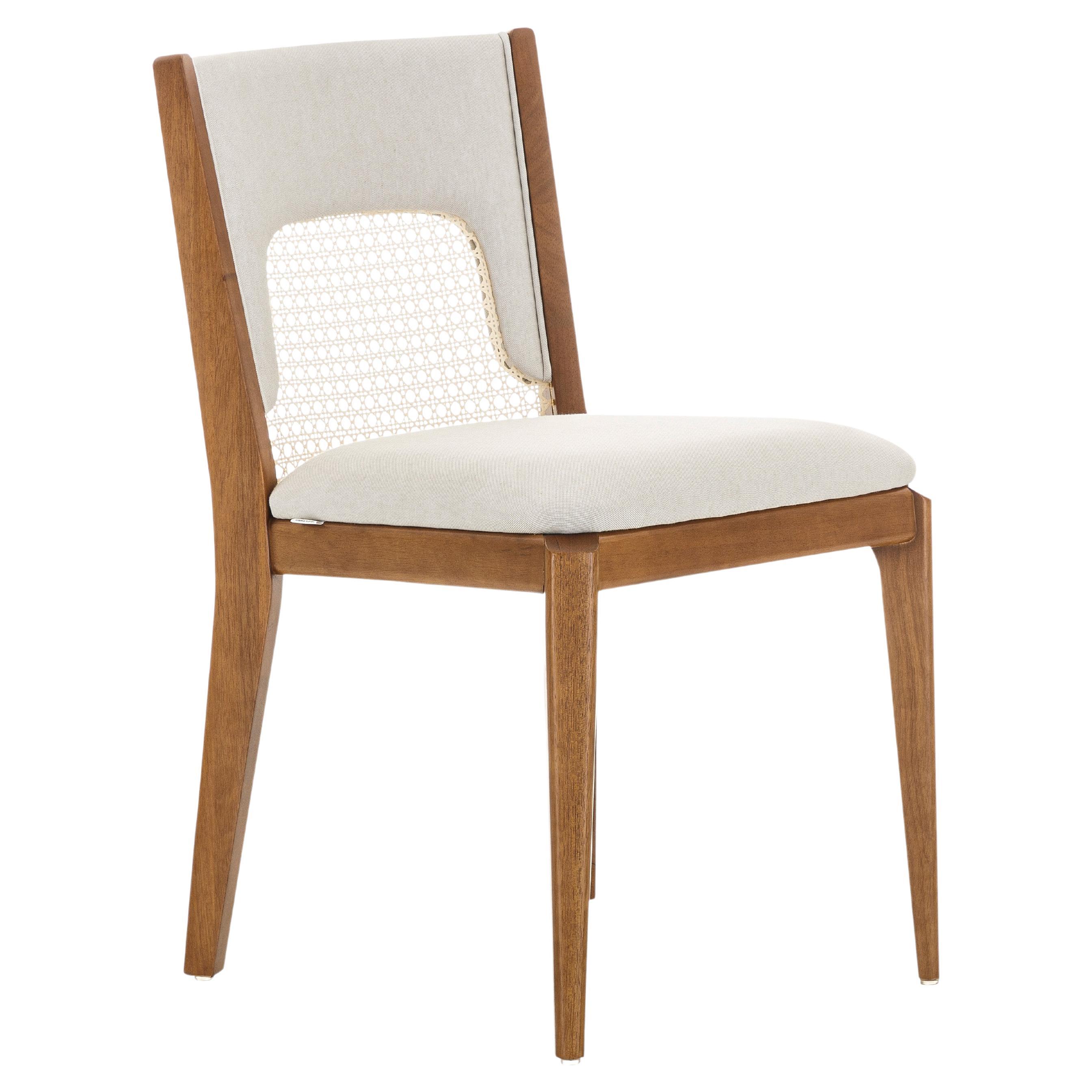 The Zani dining chair is synonymous with style, elegance, comfort, and quality with its white upholstery back and an oak wood finish. With the Zani chair, Uultis has combined all of these qualities together. A simple cane in the back seat makes a