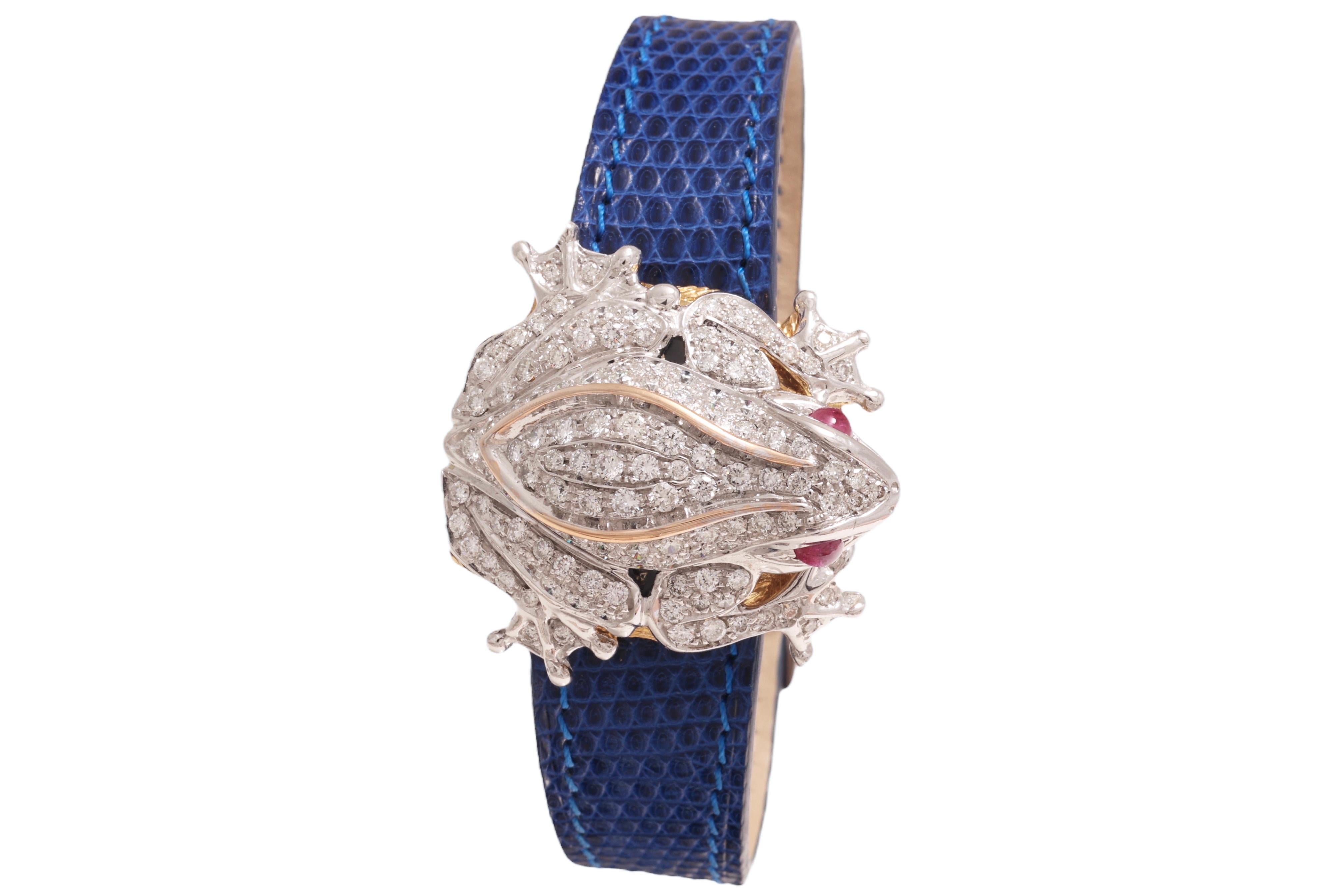 Amazing Zanetti ,Rana Scrigio Diamond watch with ruby cabuchons in eyes. 

For special occasions as it s so exceptional.

Case : 18kt solid gold

Dial : natural stone

Comes with 3 leather straps 

