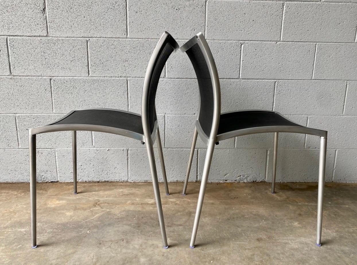 1990s vintage Zilli chair by Zanotta, made in Italy. Made from cast aluminum and black mesh fabric making these chairs stylish, comfortable, and sturdy. Perfect for a dinette, office, or living room.

In excellent vintage condition as