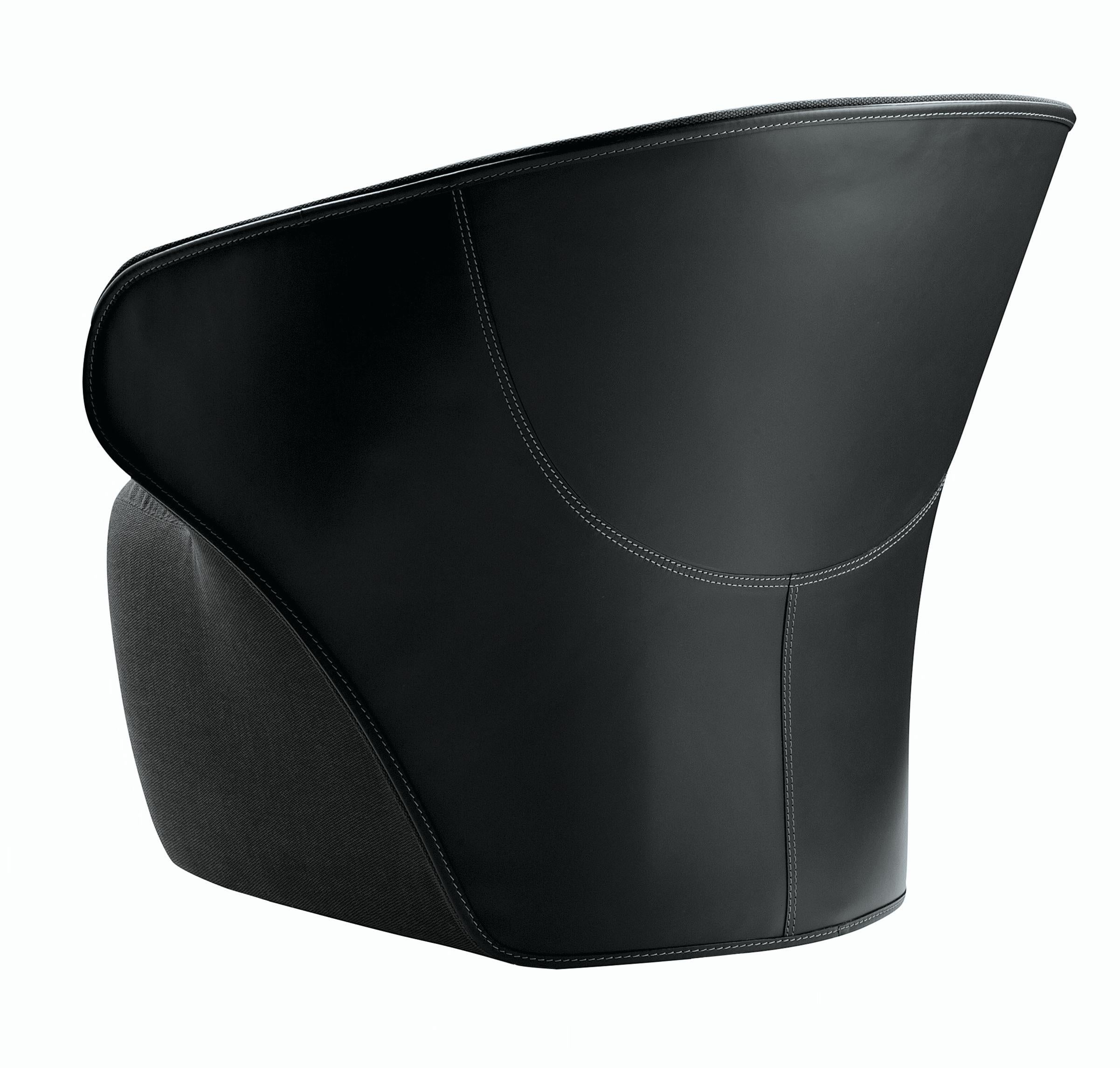 Fauteuil Zanotta Arom en tissu Talasso noir et extérieur en cuir de vache noir

Cadre en acier. Rembourrage en mousse de polyuréthane auto-extinguible/fibre de polyester thermoliée avec suspension par bandes élastiques. Couverture interne fixe en