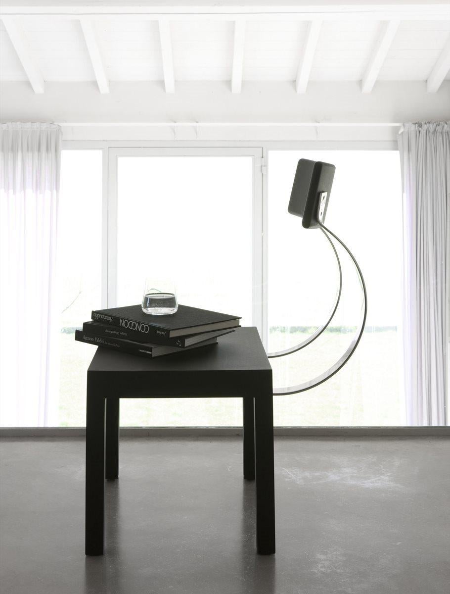 Chair. Black seat and back. 18/8 stainless steel backrest support spring.
Italy’s enfant prodige
The twentieth century produced some great masters of Italian architecture, but the most loved by critics and the most studied by theorists is still