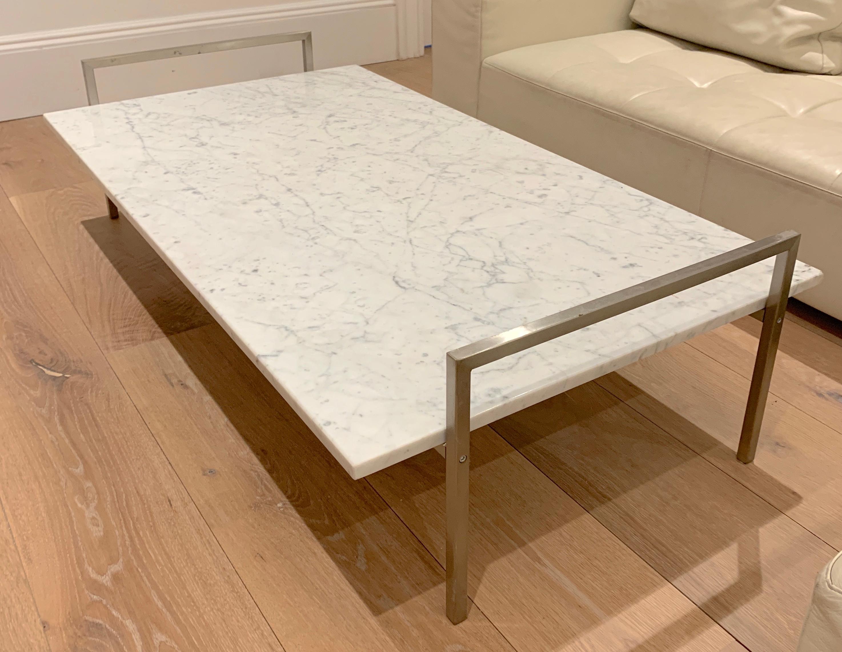 Sleek, Sturdy and immensely Sexy - this low-slung coffee table suits all rooms. A fit for modern minimalism but made with timeless materials that suit contemporary, traditional and even eclectic styles. 

Table comes in two pieces: Marble Slab