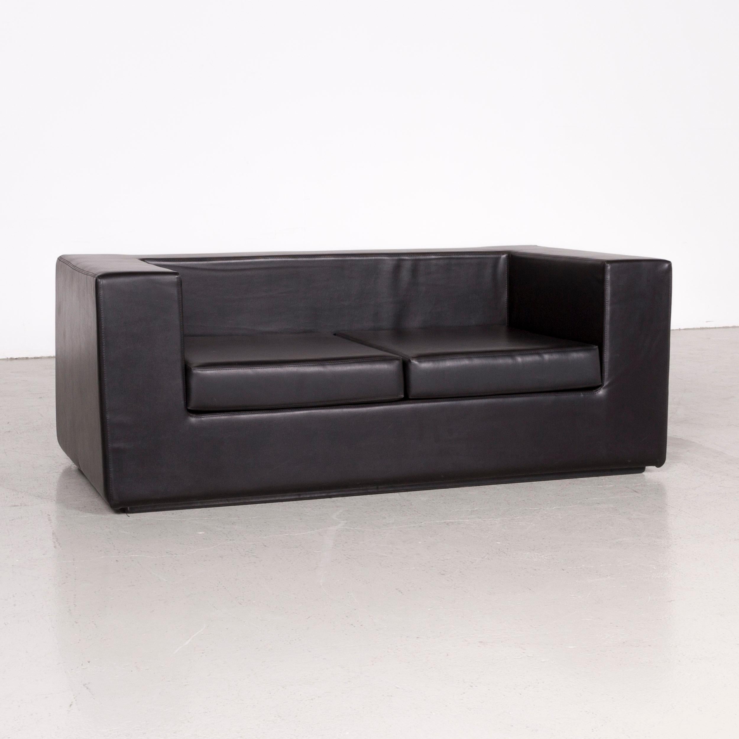 We bring to you a Zanotta Throw Away designer leather sofa black by Willie Landels real leather.
SKU: #7488

Product Measurements in centimeters:

Depth: 75
Width: 150
Height: 60
Seat-height: 35
Rest-height: 60
Seat-depth: 55
Seat-width: