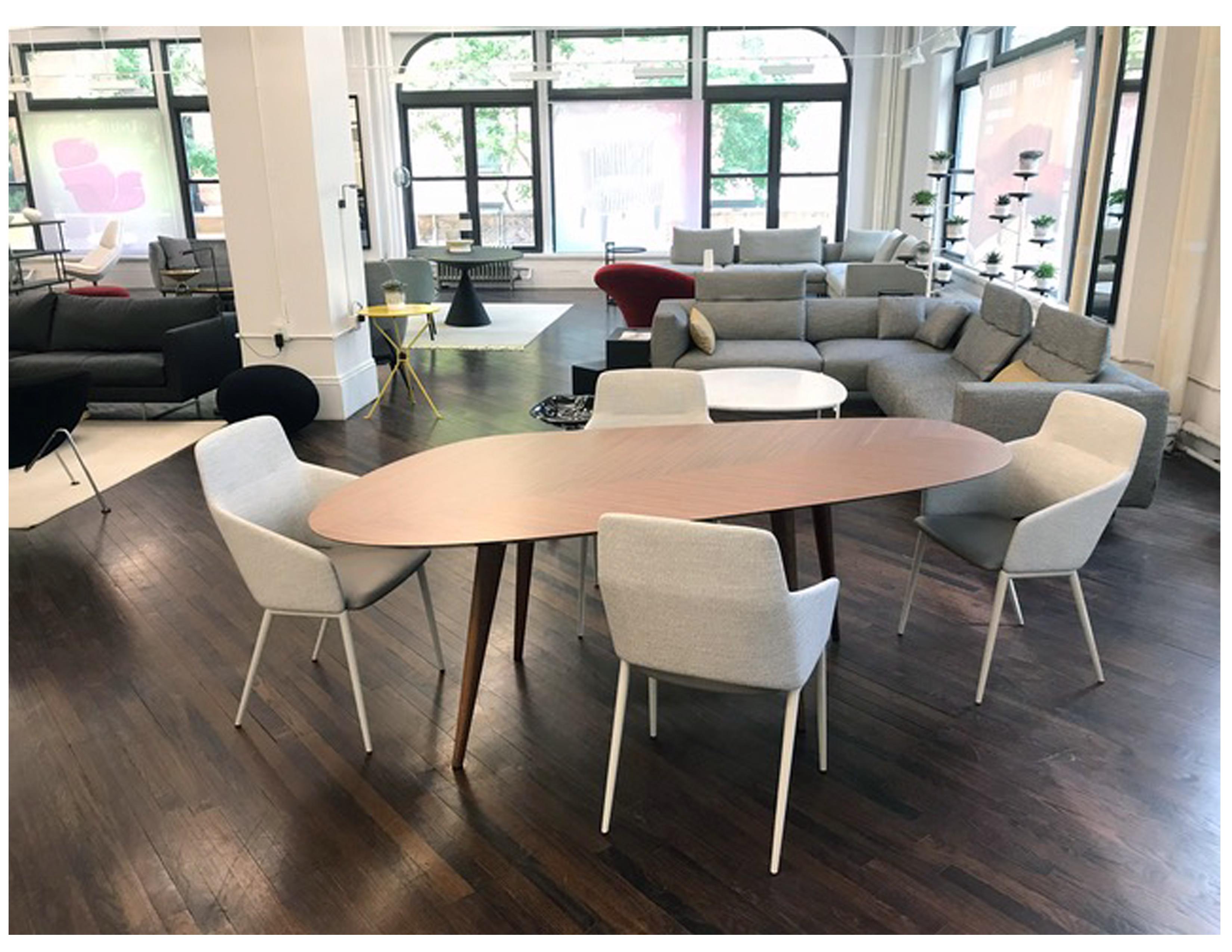 Tweed 217
Measure: 217 x 100 walnut
Table. Top in natural painted Canaletto walnut veneered wood, with black painted under-top. Smoothly irregular shape.
Not just a simple exercise of scale but different models to allow gathering together or a