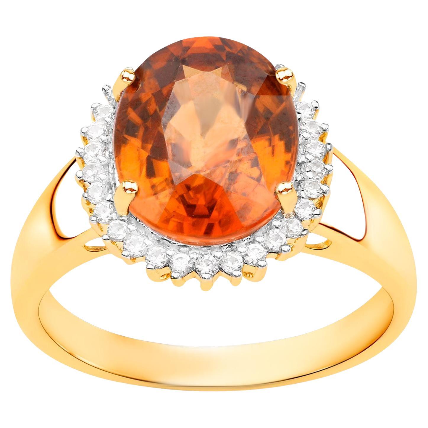 Anello con zircone arancione di Zanzibar Zircone bianco aureolato 3,95 carati placcato oro giallo 14K in vendita