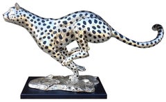 Silver-plated bronze cheetah running sculpture