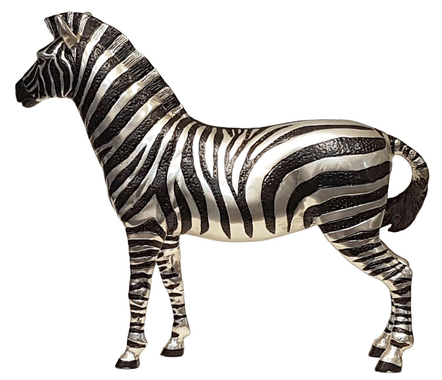 Zawadi offers a wide range of silver-plated bronze sculptures, which have been carefully designed and created for the discerning buyer. We have used the “lost wax” technique in casting, which is the preferred method, as it brings out every little
