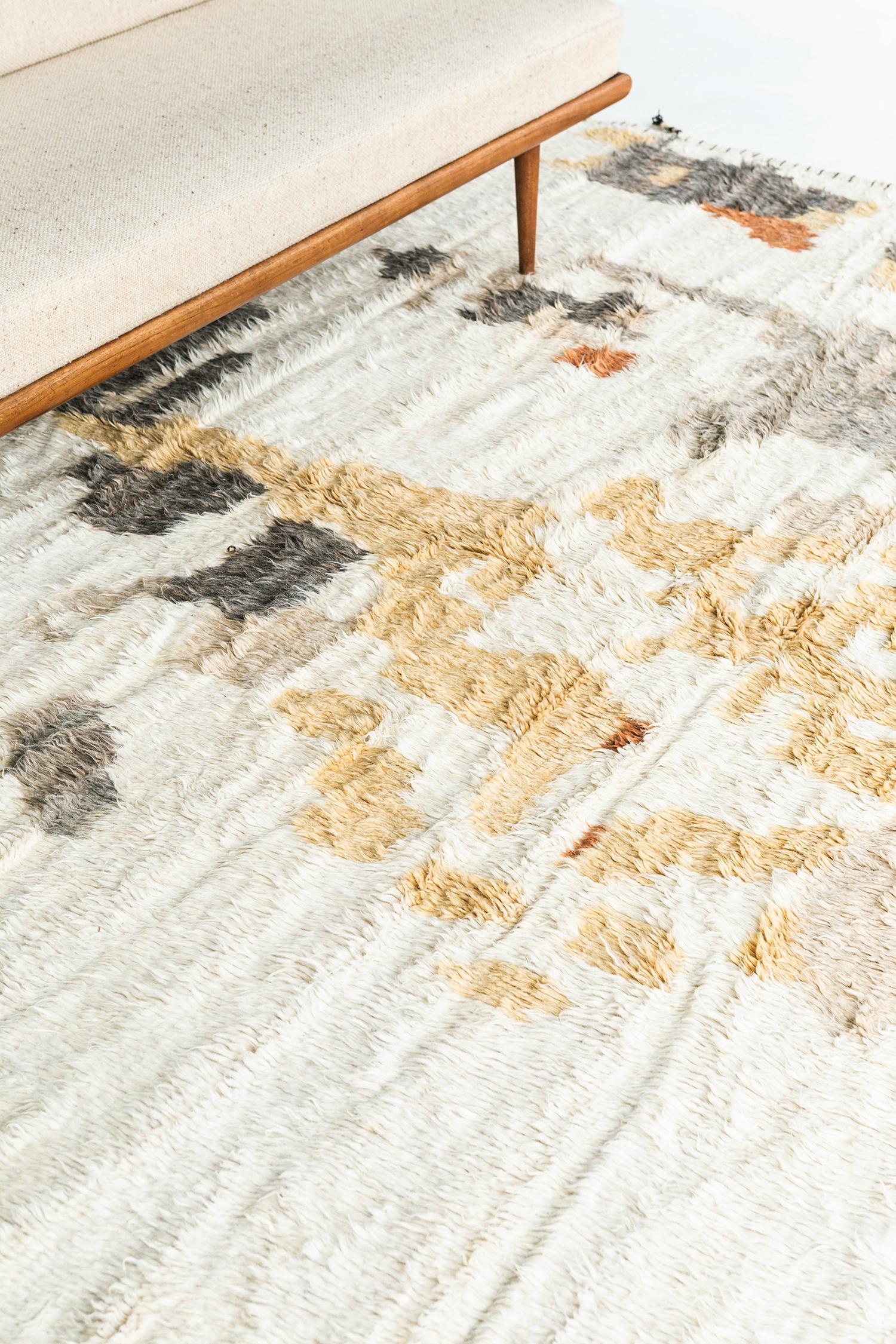 Zazate' is made of luxurious wool and is made of timeless design elements. Its weaving of natural earth tones with golden yellow and unique design elements is what makes the Atlas Collection so unique and sought after. Mehraban's Atlas collection is