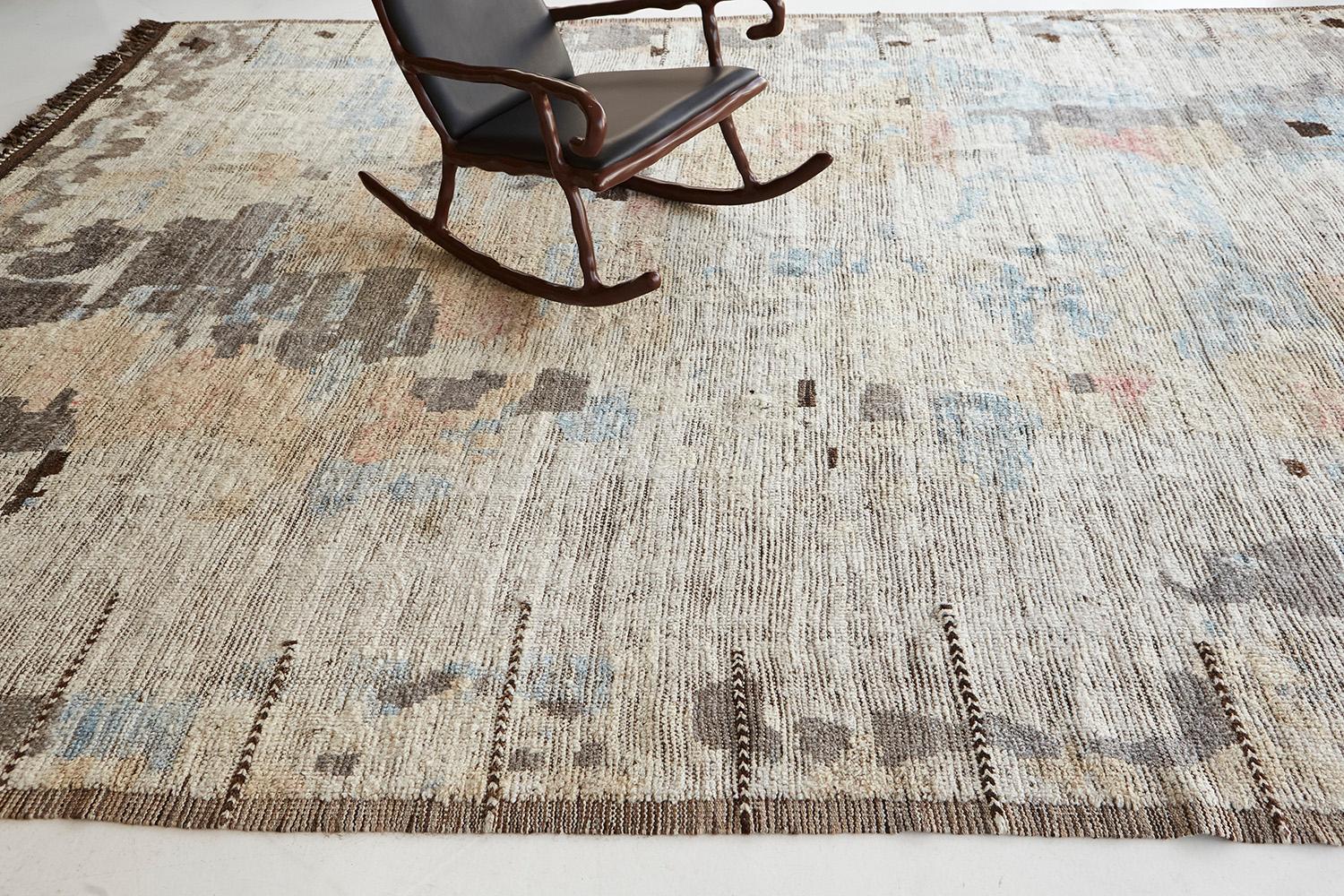 Zazate' is made of luxurious wool and is made of timeless design elements. It's weaving of natural earth tones with vibrant blues and unique design elements is what makes the Atlas Collection so unique and sought after. Mehraban's Atlas collection
