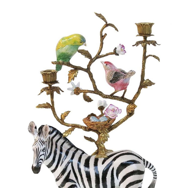 Sculpture candleholder zebra all hand
painted, in white porcelain with brass details.
Candleholder part on the top in solid
brass and with hand-painted porcelain.
Also available in zebra sculpture, without
the candleholder part, price: 950,00€.