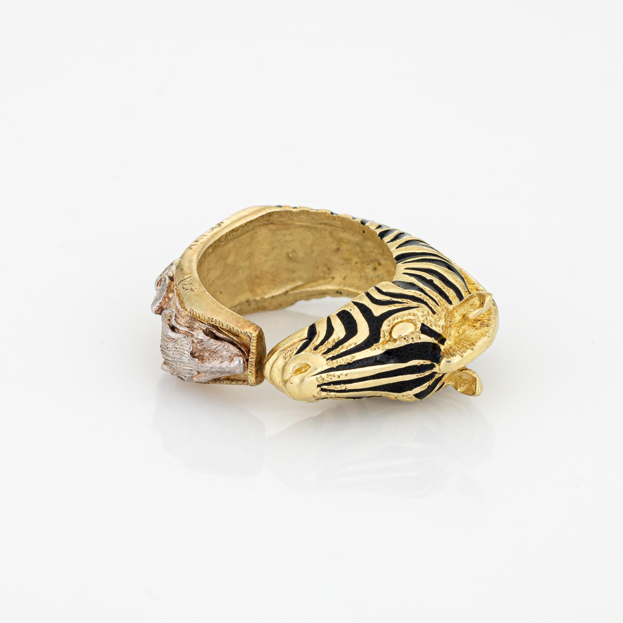 Finely detailed vintage Zebra & Foxes ring crafted in 18 karat yellow gold and sterling silver. 

The beautifully crafted animal themed ring features a lifelike rendering of the bust of a Zebra. To the base of the ring is three fox heads in keeping