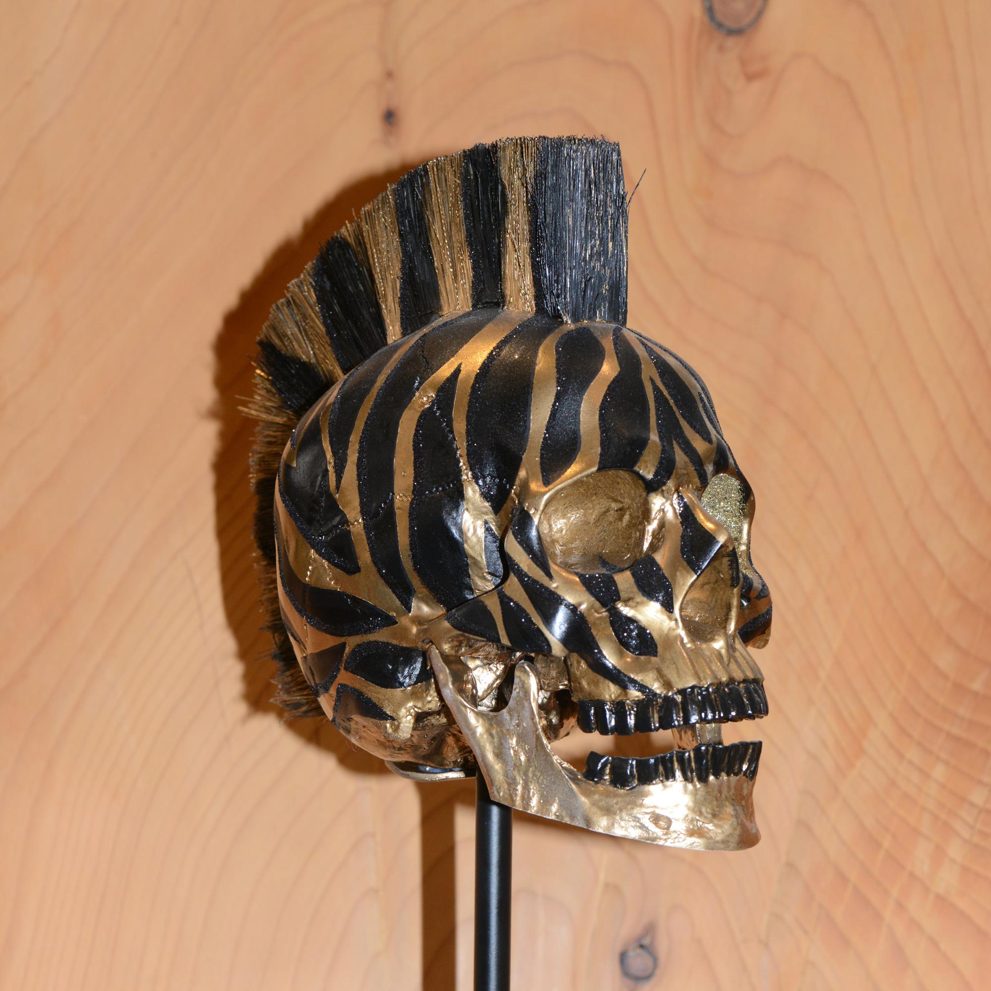 Annerito Teschio Zebra Oro in vendita