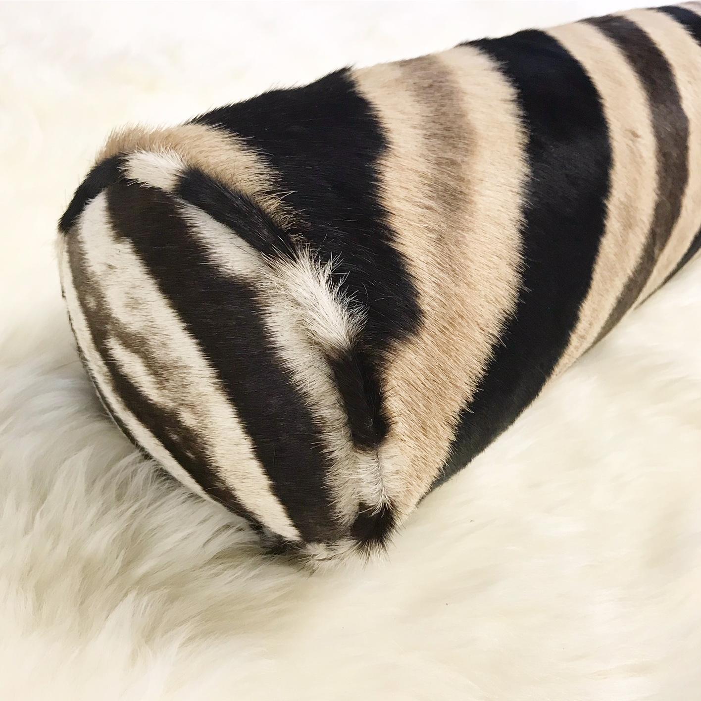 Forsyth Zebra hide pillows are simply the best. The most beautiful hides are selected, hand cut, hand-stitched, and hand stuffed with the finest goose down. Each step is meticulously curated by Saint Louis based Forsyth artisans. Every pillow is a