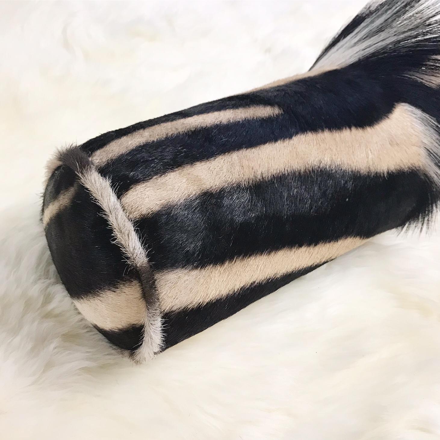 Forsyth zebra hide pillows are simply the best. The most beautiful hides are selected, hand-cut, hand stitched, and hand stuffed with the finest goose down. Each step is meticulously curated by Saint Louis based Forsyth artisans. Every pillow is a