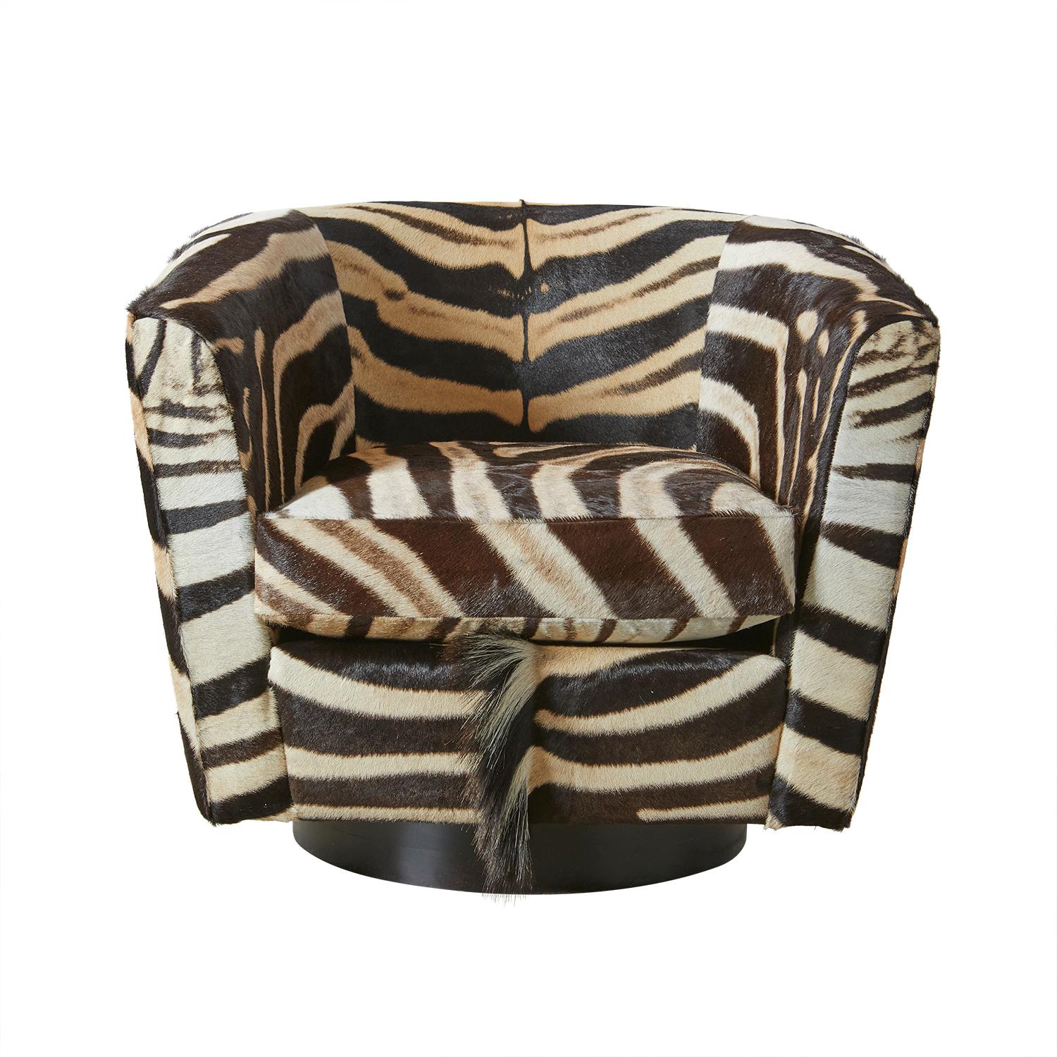 Genuine zebra hide creates an occasional chair sure to make a statement. Each chair requires two full hides to upholster and manufacture making every chair one-of-a-kind. Due to the use of natural materials, each piece is unique and may vary