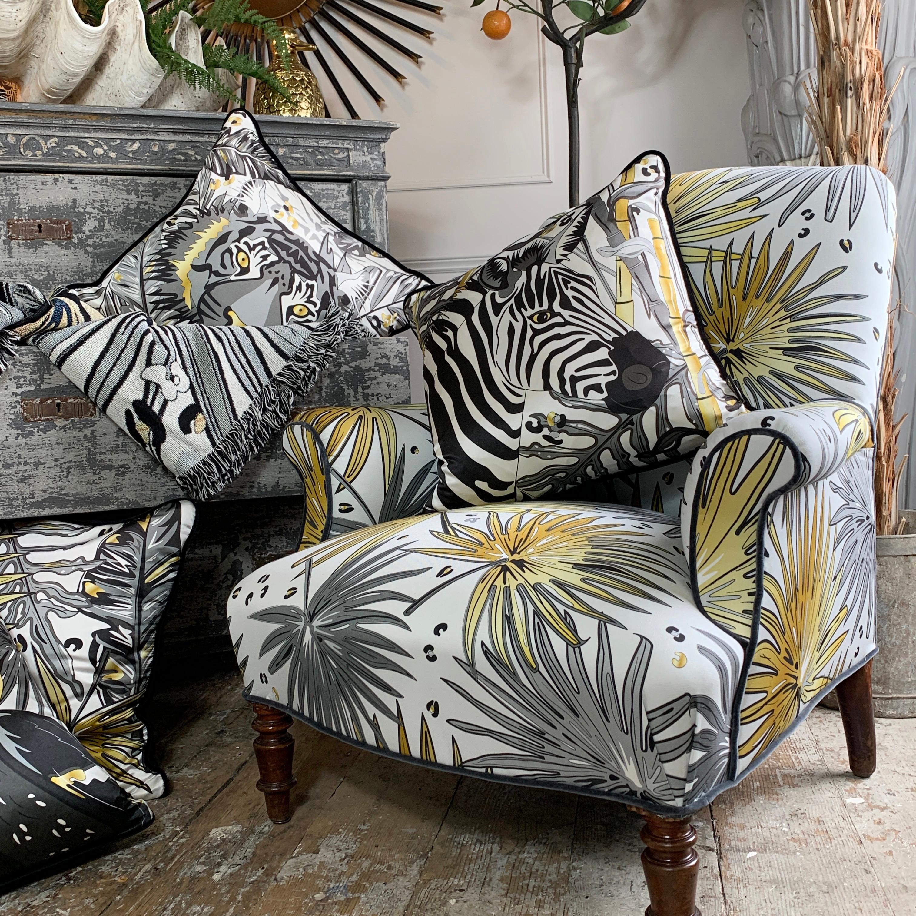 Explore distant savannahs with our luxury silk 'Zebra' cushion from the Tropics range

This luxurious 100% silk cushion has a rich cotton velvet back and piped edge

Designed with inspiration from large lush tropical jungle leaves and one of natures
