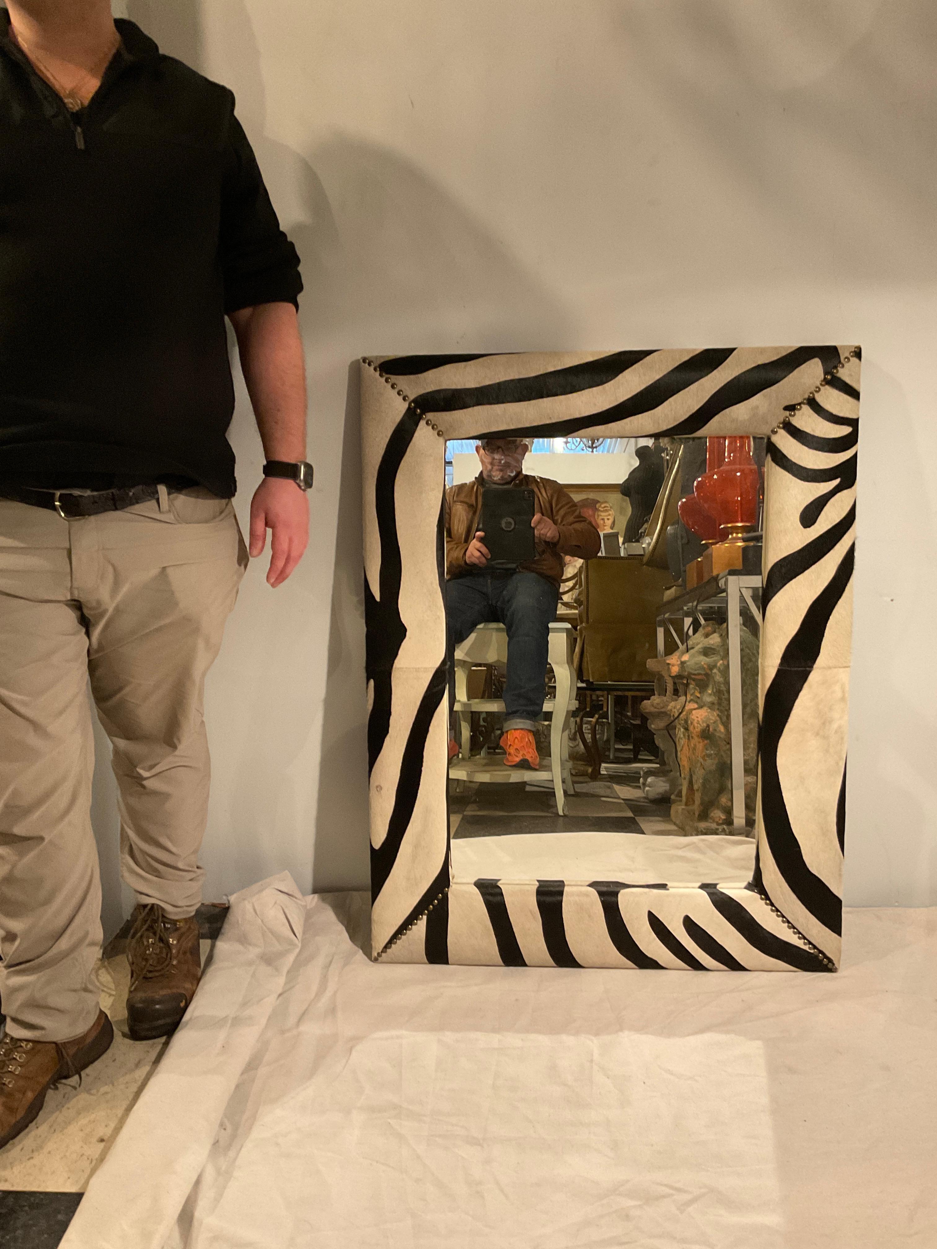 Zebra pattern cowhide mirror. A nick in hide as shown in picture.