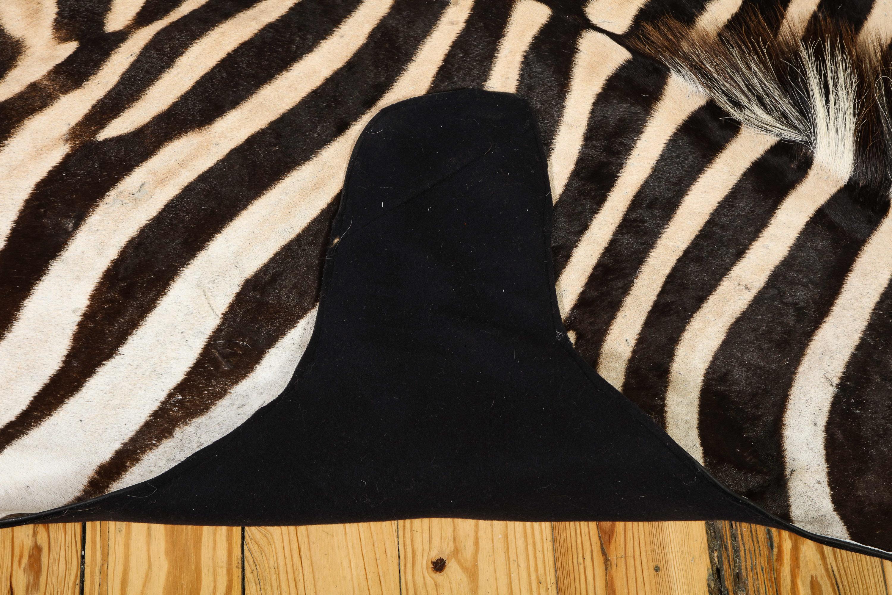 Hand-Crafted Zebra Rug, South Africa, Wool Felt Backed with Leather Trim, New Hide, In Stock For Sale
