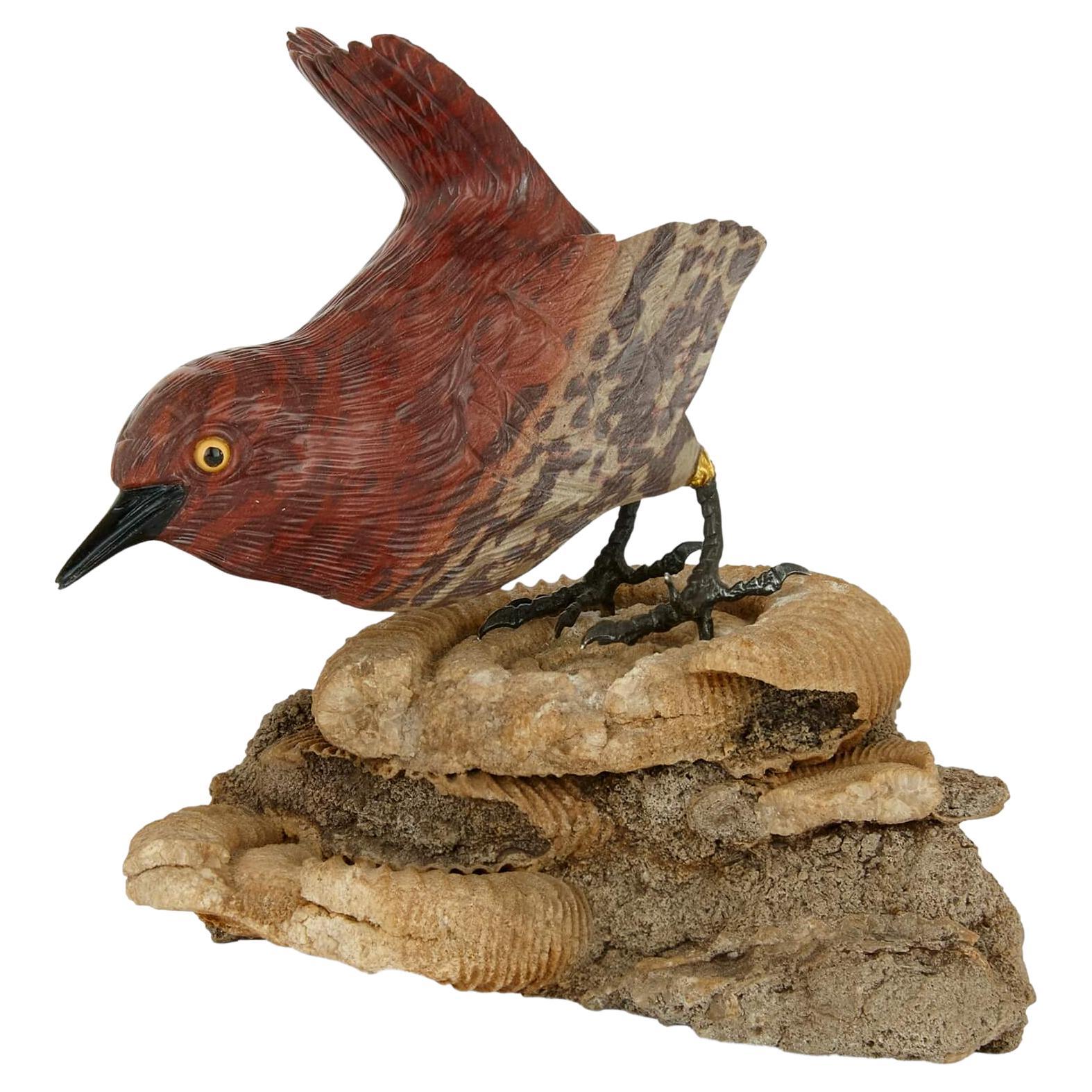 Modèle d'oiseau en pierre zébrée et en argent 