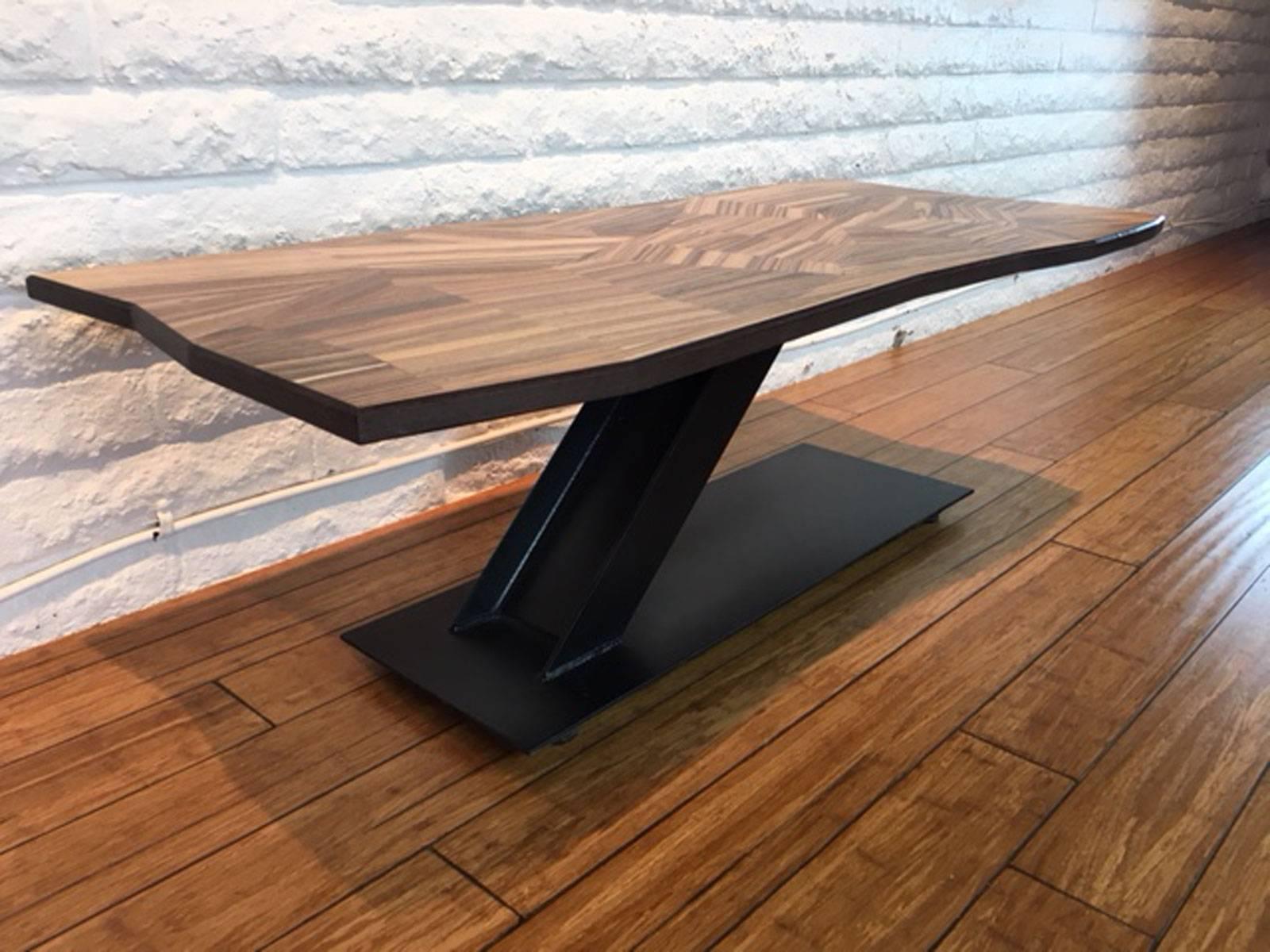 Iron and zebrawood coffee table designed, produced and made by master wood artist and designer Scott Mills who only uses reclaimed (deadfall or storm downed trees) in the pieces he designs and produces. Appropriate for home or commercial use. No
