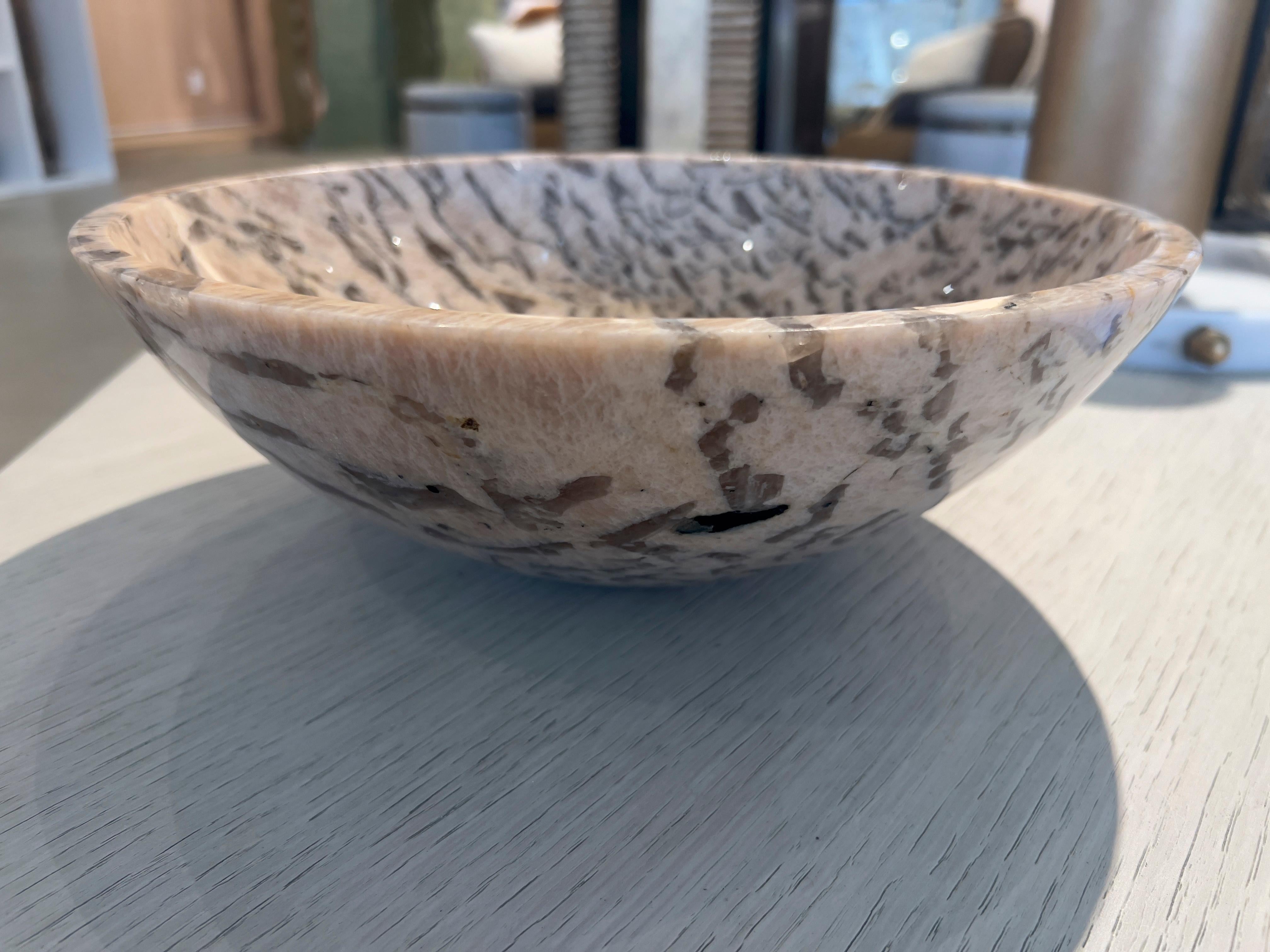 This beauty is hand-carved and hand-polished and comes from Madagascar. Zebradorite brings balance and harmony and is beautiful in any space.  Zebradorite is also a relatively rare and unique Feldspar.  Measures 12