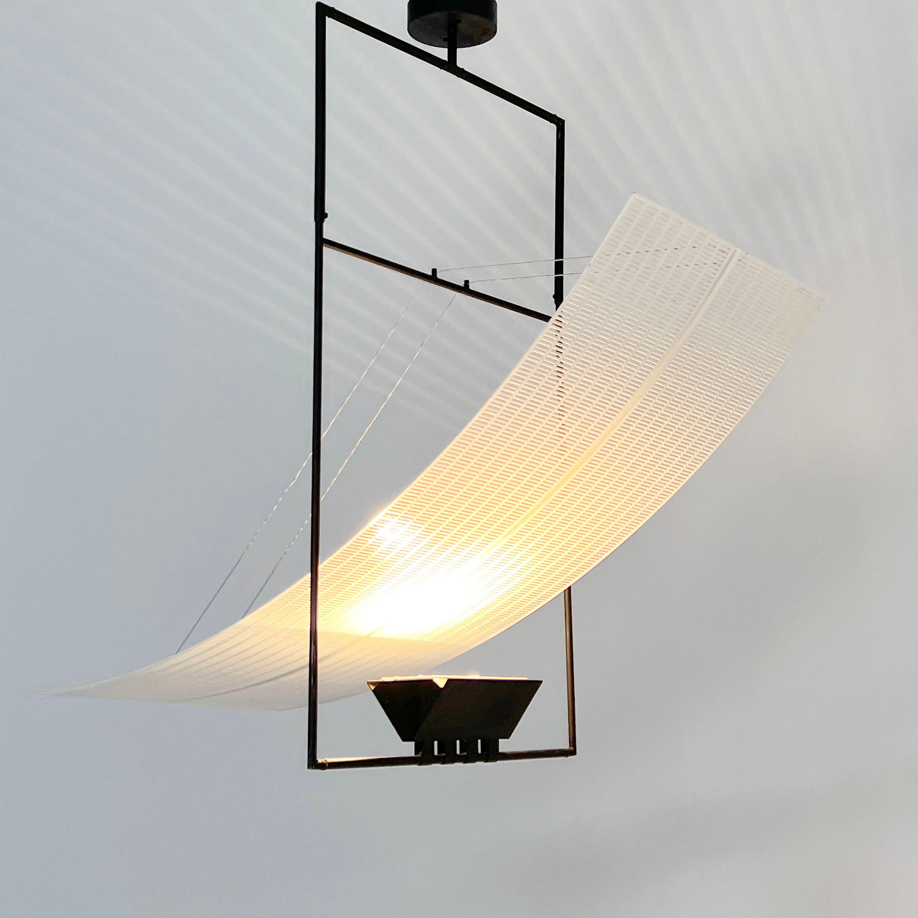 Designer - Mario Botta
Producer - Artemide
Model - Zefiro Hanging Lamp
Design Period - Eigthies
Measurements - Width 50 cm x Depth 97 cm x Height 100 cm
Materials - Iron, Steel 
Color - Black & White
Electrical Properties - Lightbulb R7S (up to