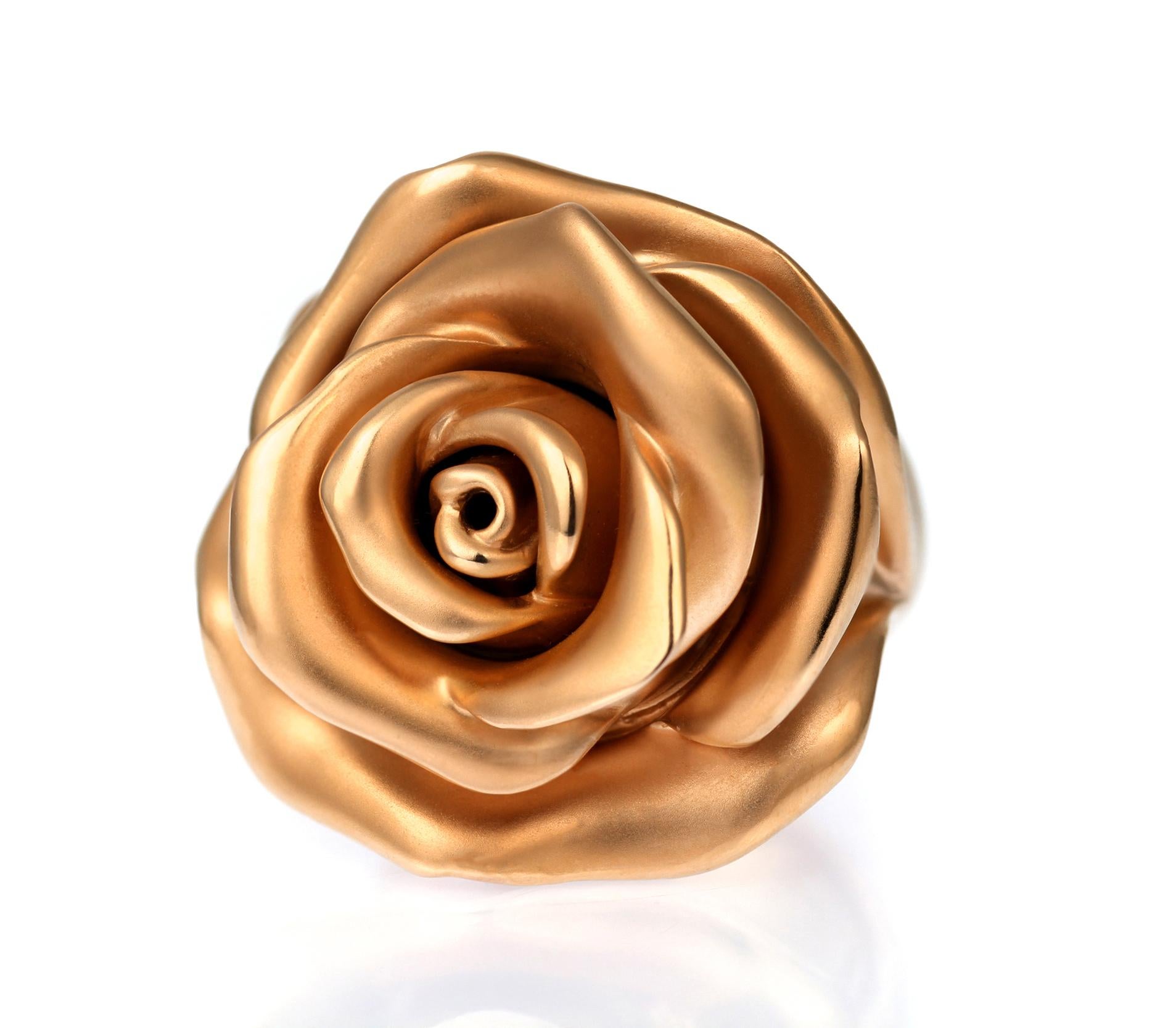 Designed as a rose in bloom, with a removable rose head, revealing a concealed rose gold perfume compartment. 
This piece is signed by Zegg & Cerlati and shows the French assay mark for 18-carat gold.  
It also includes the maker's case and