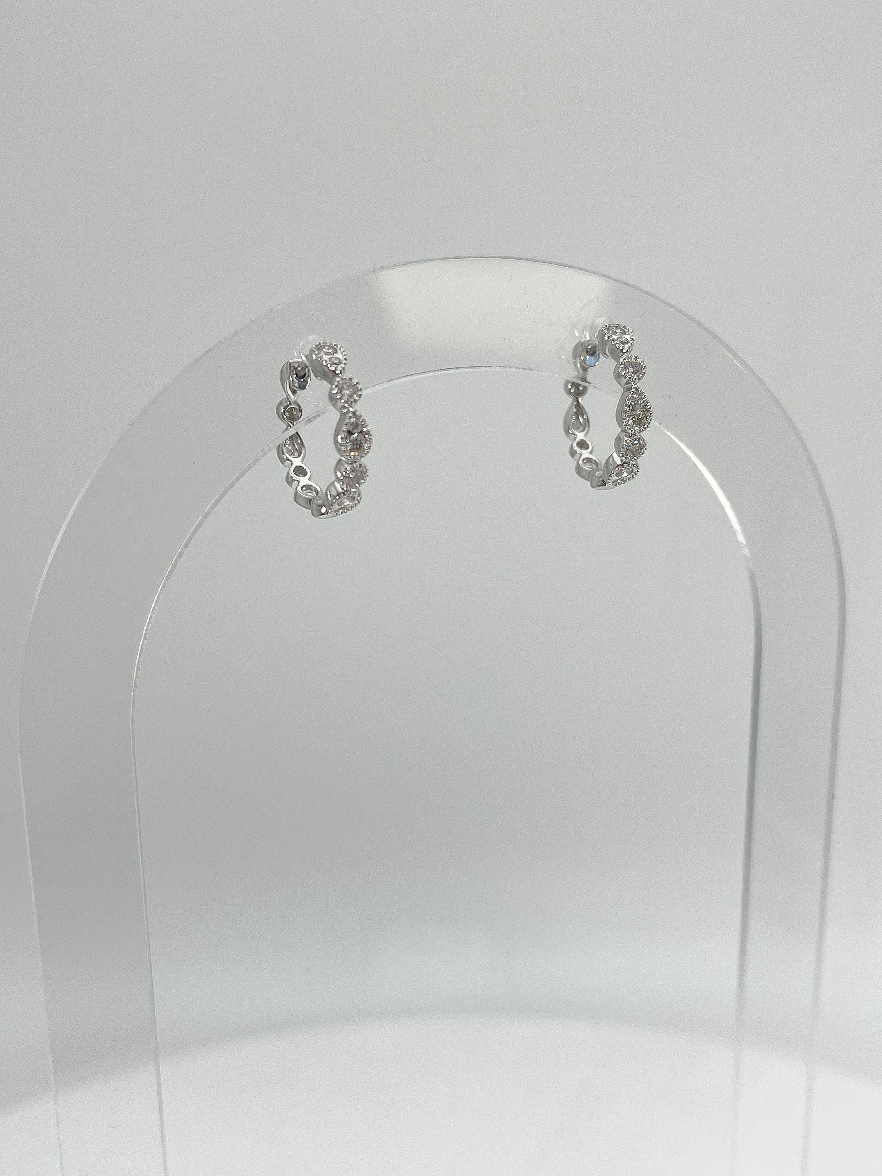 Round Cut Zeghani 14K White Gold .24 CTW Diamond Huggie Hoop Earrings For Sale
