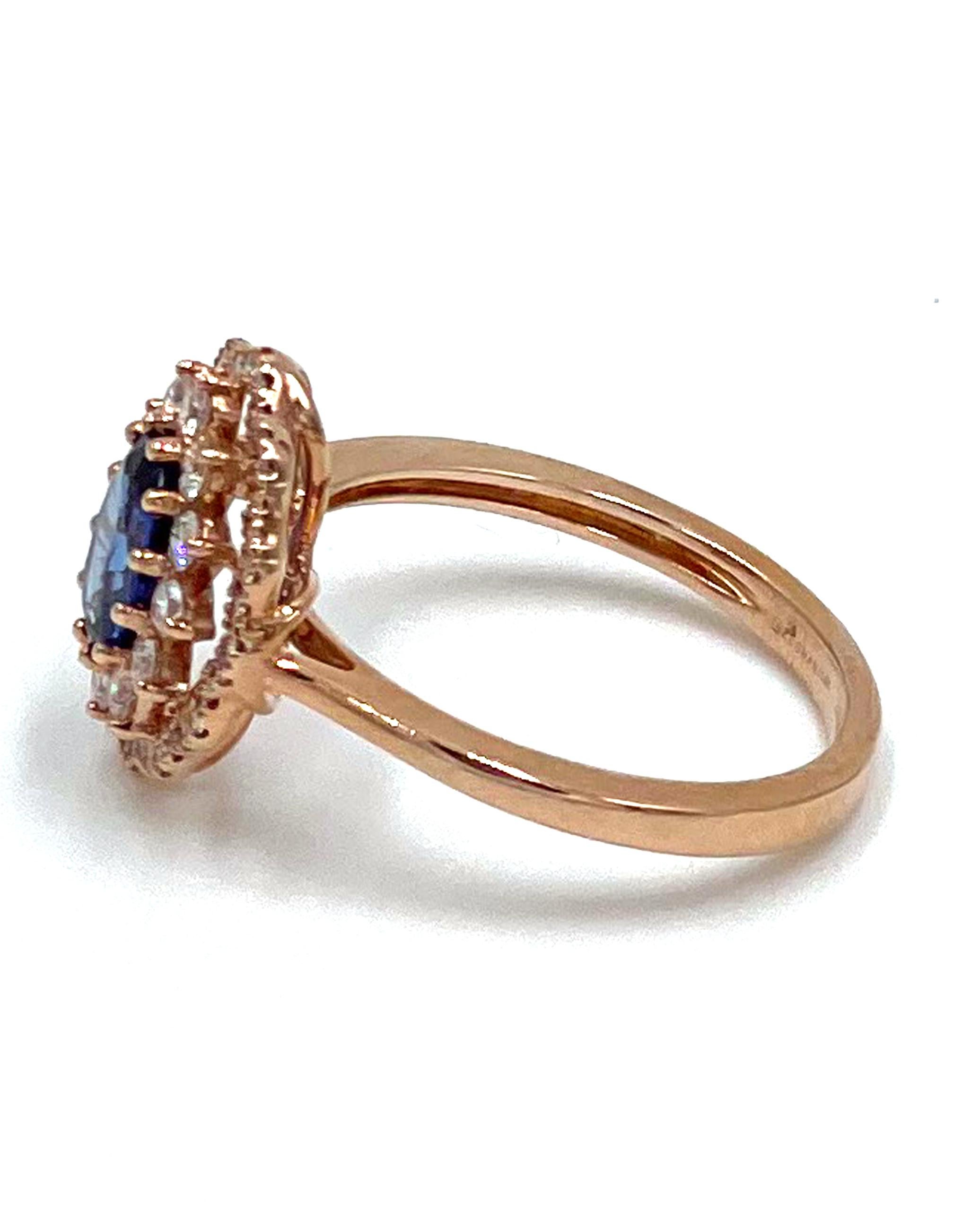 14K rose gold ring made by Zeghani featuring one oval shape blue sapphire 0.84 carat.  The sapphire is surrounded by 50 round brilliant-cut diamonds 0.41 carat total weight. 

* Style No. ZR2012
* The diamonds are H color, SI1 clarity.
* Finger size