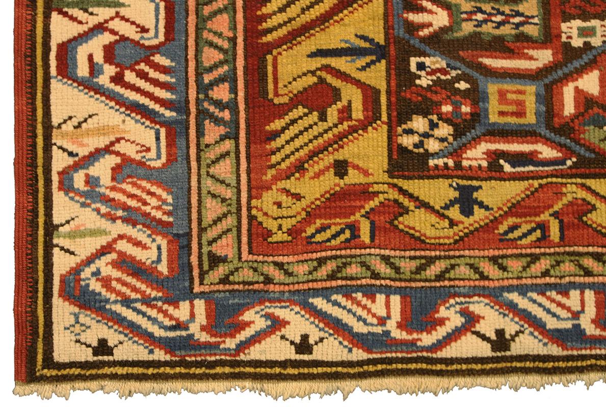 Seychour Rug – Caucasian Precision and Geometric Splendor

This exquisite Seychour rug showcases the characteristic brilliance of Caucasian weaving with its rich geometric field and vibrant color palette. The central field features repeating