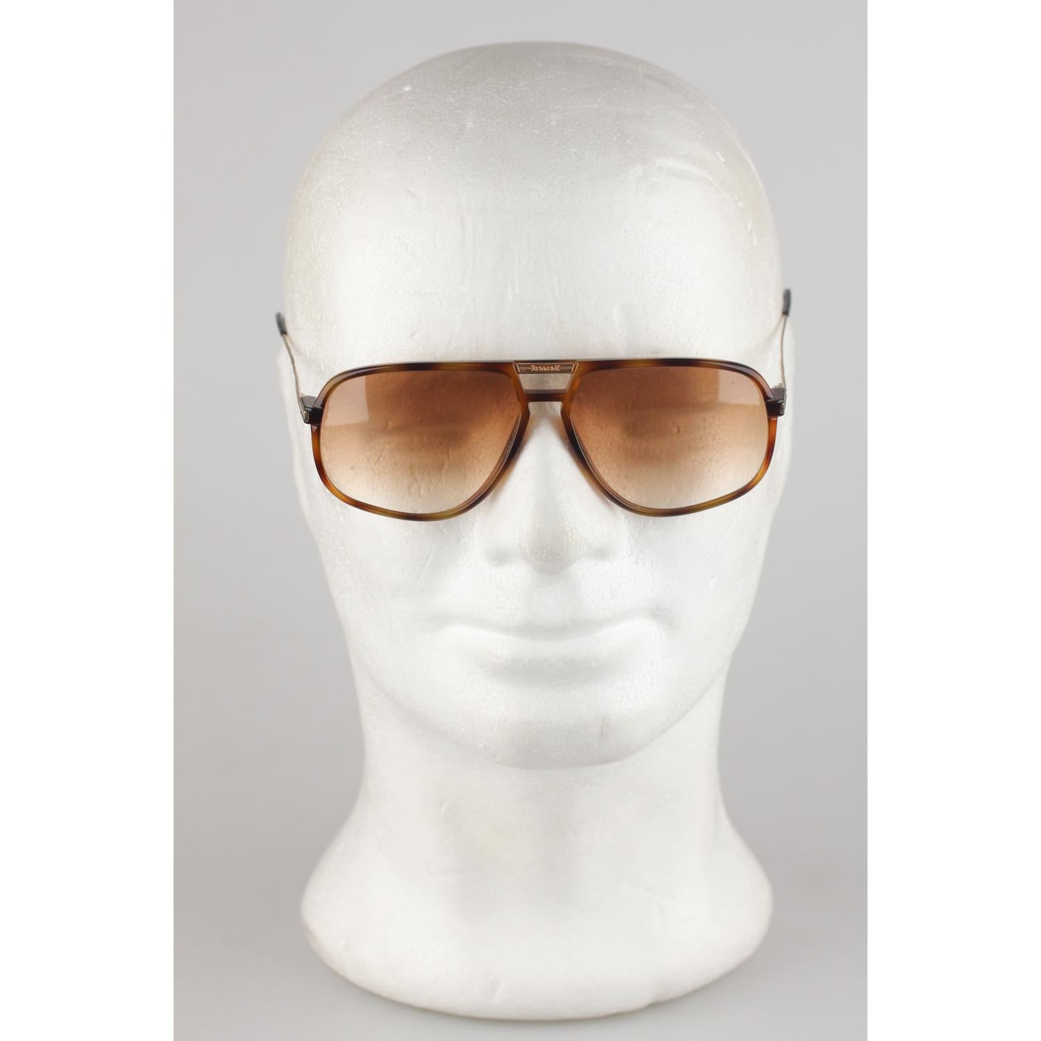 MATERIAL: Acetate,Metal

COLOR: Brown

MODEL: SOFYL F56

GENDER: Adult Unisex

SIZE: Large

COUNTRY OF MANUFACTURE: Italy

Condition
CONDITION DETAILS:

MINT CONDITION - No visible wear - NEW 100% total UV protection lenses. They will come with a
