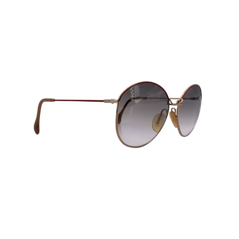 Raffinées mais pleines de caractère, ces lunettes de soleil ovales Zeiss Vintage Women R 6804 2490 sont un exemple étonnant de la rencontre entre la précision allemande et le flair artistique des années 1980. Fabriqué en Allemagne, ce modèle allie
