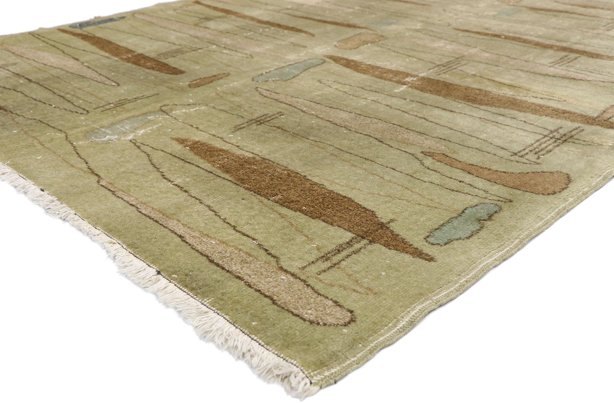 52582 Zeki Muren distressed vintage Turkish Sivas rug with Art Deco Bauhaus style. Decidedly modern and retro in feel, this hand-knotted wool distressed vintage Turkish Sivas rug displays all the intrigue of Bauhaus design. Softly outlined elongated
