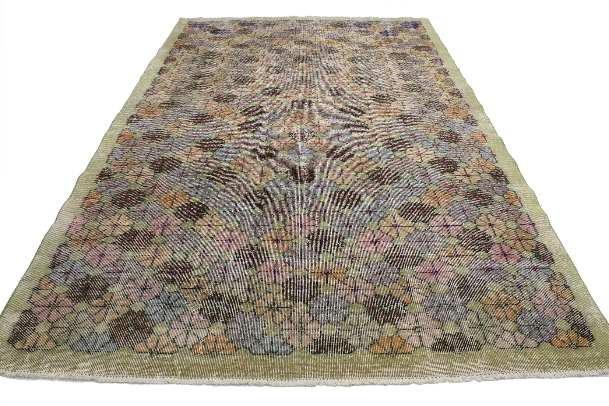 52023 Zeki Muren distressed vintage Turkish Sivas rug with Industrial Art Deco style. With its lively all-over geometric pattern and Industrial Art Deco style, this distressed vintage Turkish Sivas rug is easy to love. The all-over geometric