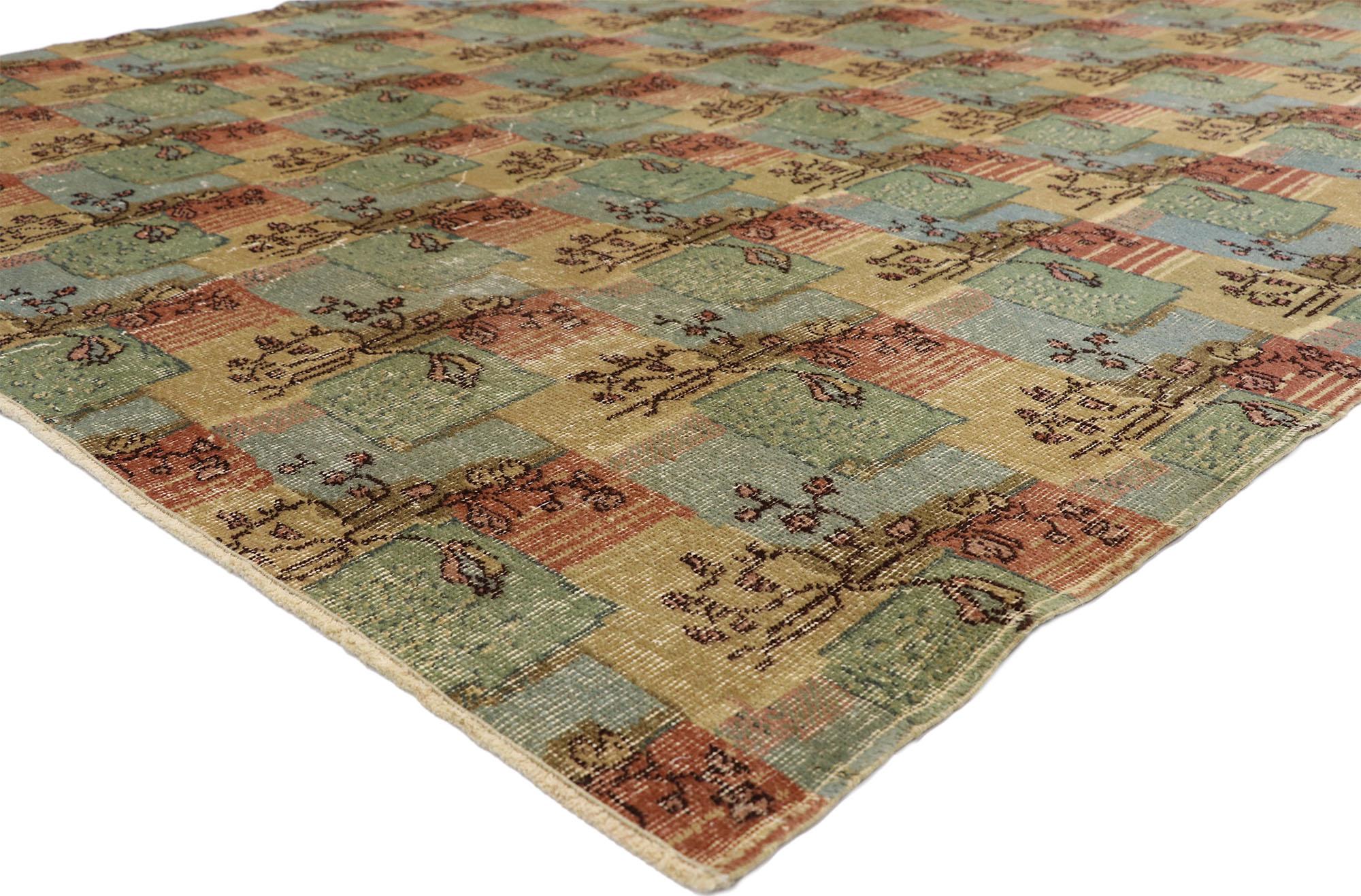 52574 Zeki Muren distressed vintage Turkish Sivas rug with shabby chic cottage style. This hand knotted wool distressed vintage Turkish Sivas rug features an all-over patchwork pattern spread across an abrashed field. The geometric pattern is