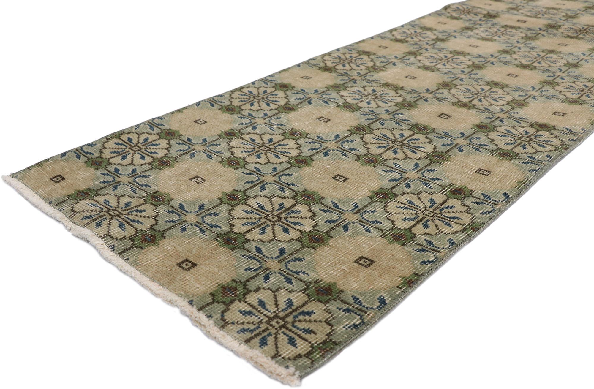 52613, Zeki Muren distressed vintage Turkish Sivas Runner with Swedish Farmhouse style. Lovingly timeworn with Gustavian grace, this hand knotted wool distressed Turkish Sivas runner beautifully embodies a Swedish Farmhouse style. The field is