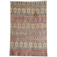 Zeki Muren, Distressed Retro Turkish Sivas Rug with Industrial Art Deco Style