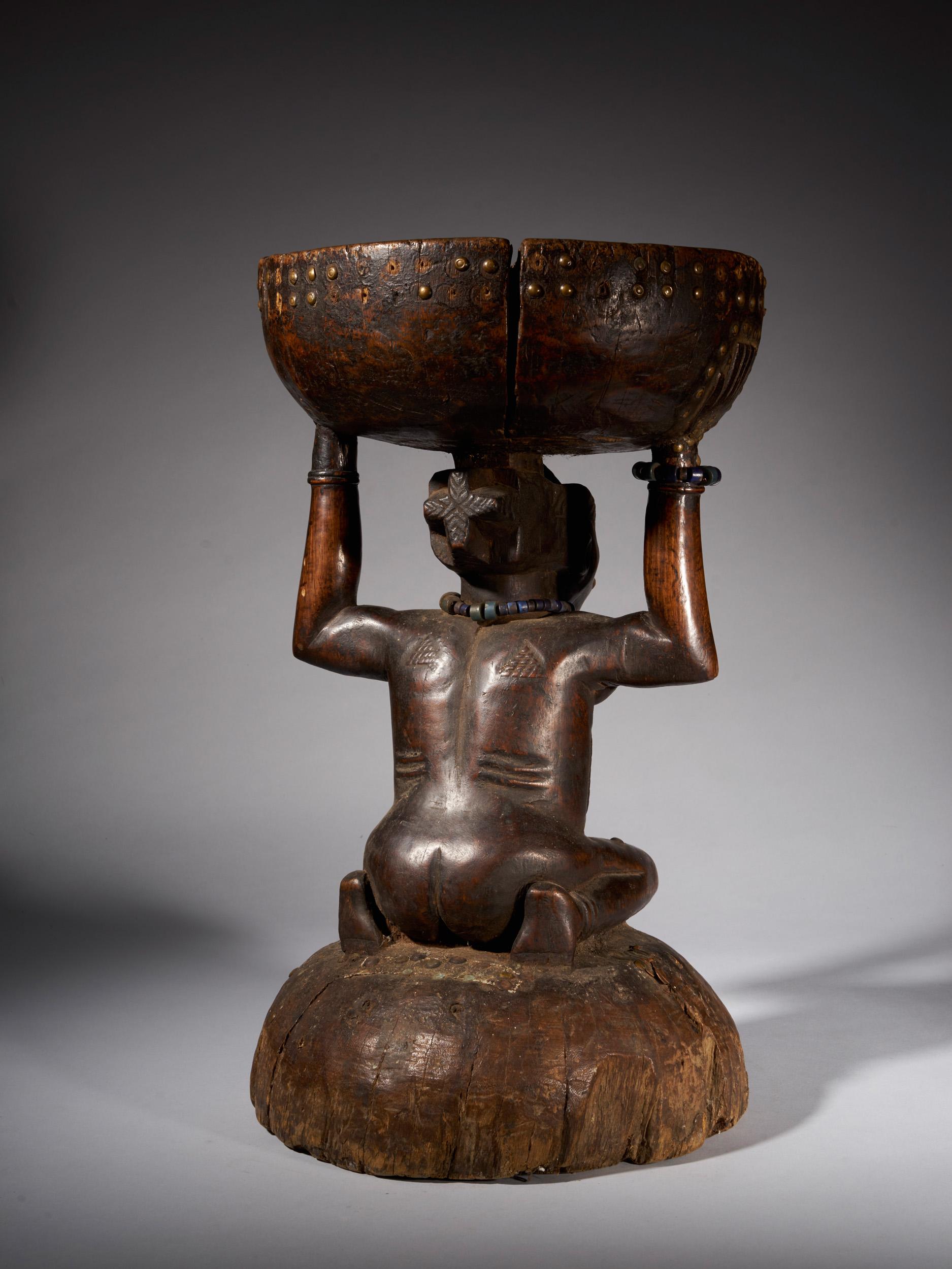 Hand-Carved Zela Caryatide Stool held by a Female sculpture covered with with scarifications For Sale