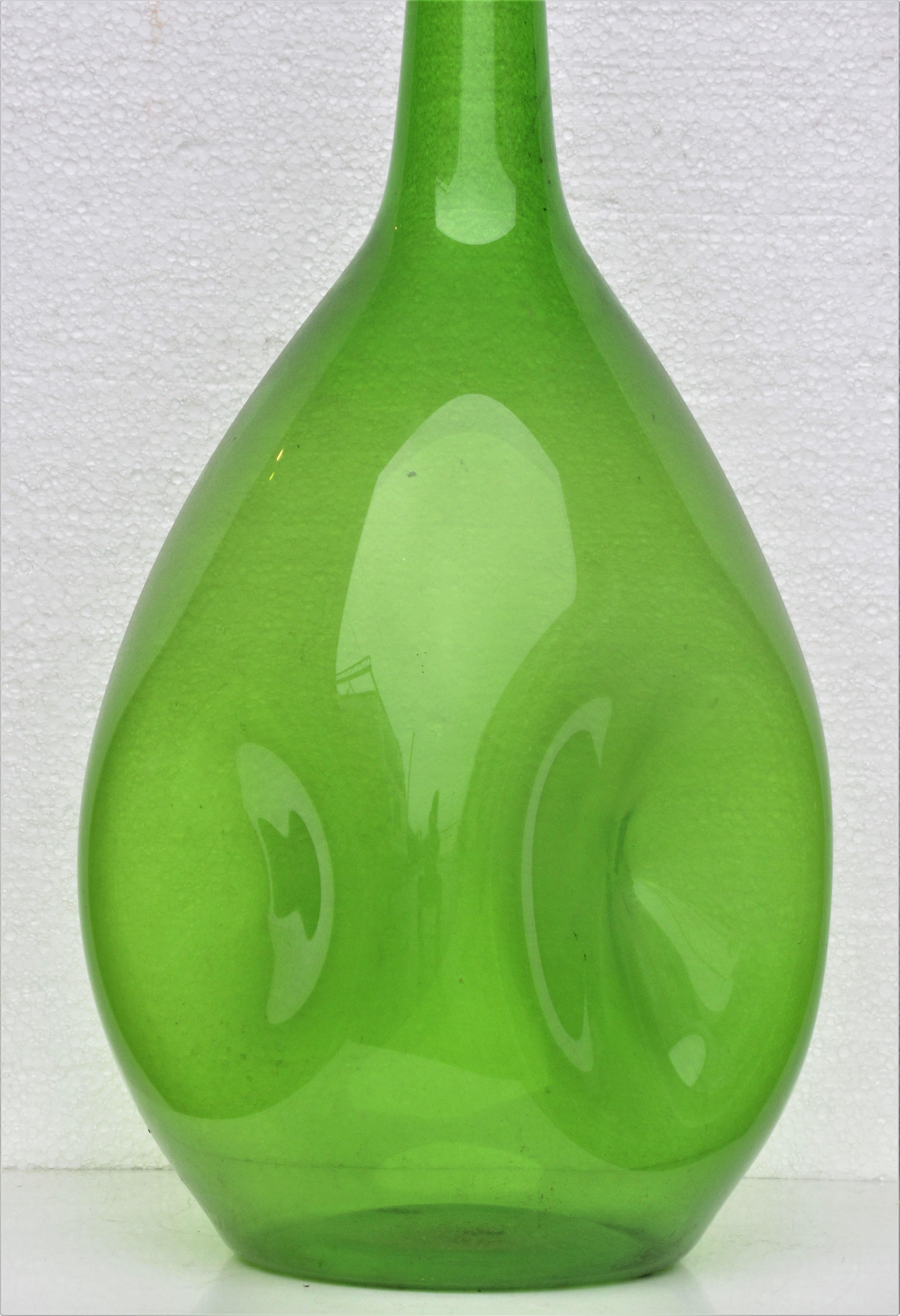 Zeller Glass Company blown glass large dimpled vessel with beautiful luminous green color and great sculptural form, circa 1960.