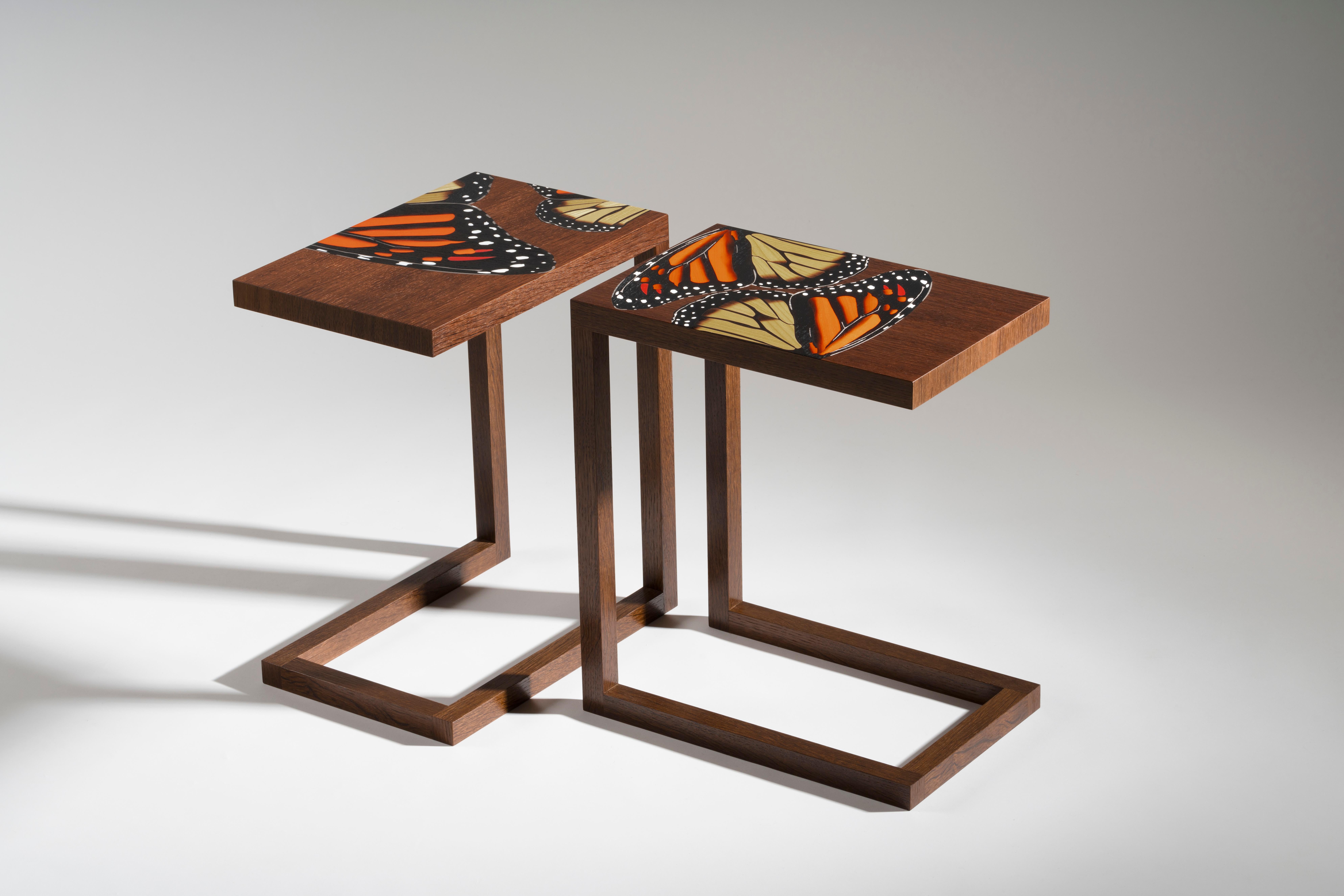 Zelouf + Bell's end tables are delicate-looking, yet surprisingly strong and stabile. Graphic fragments of butterfly wings created with marquetry using pressure-dyed timbers inlaid in a smoked oak background hand-rubbed to satin finish. Available in